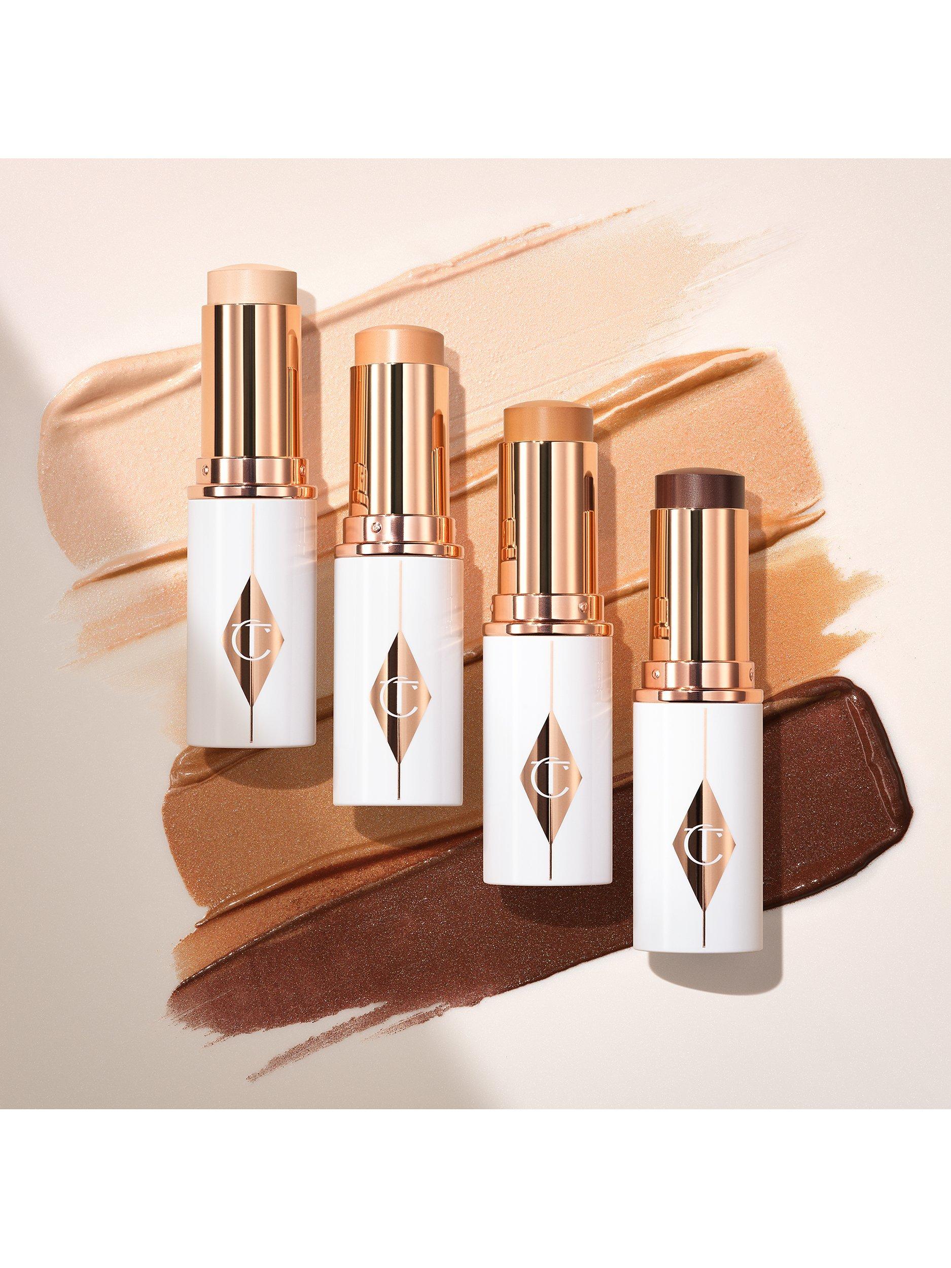 Product image 4 of 7, which shows Charlotte Tilbury Unreal Skin Foundation Stick, 12.5 Tan