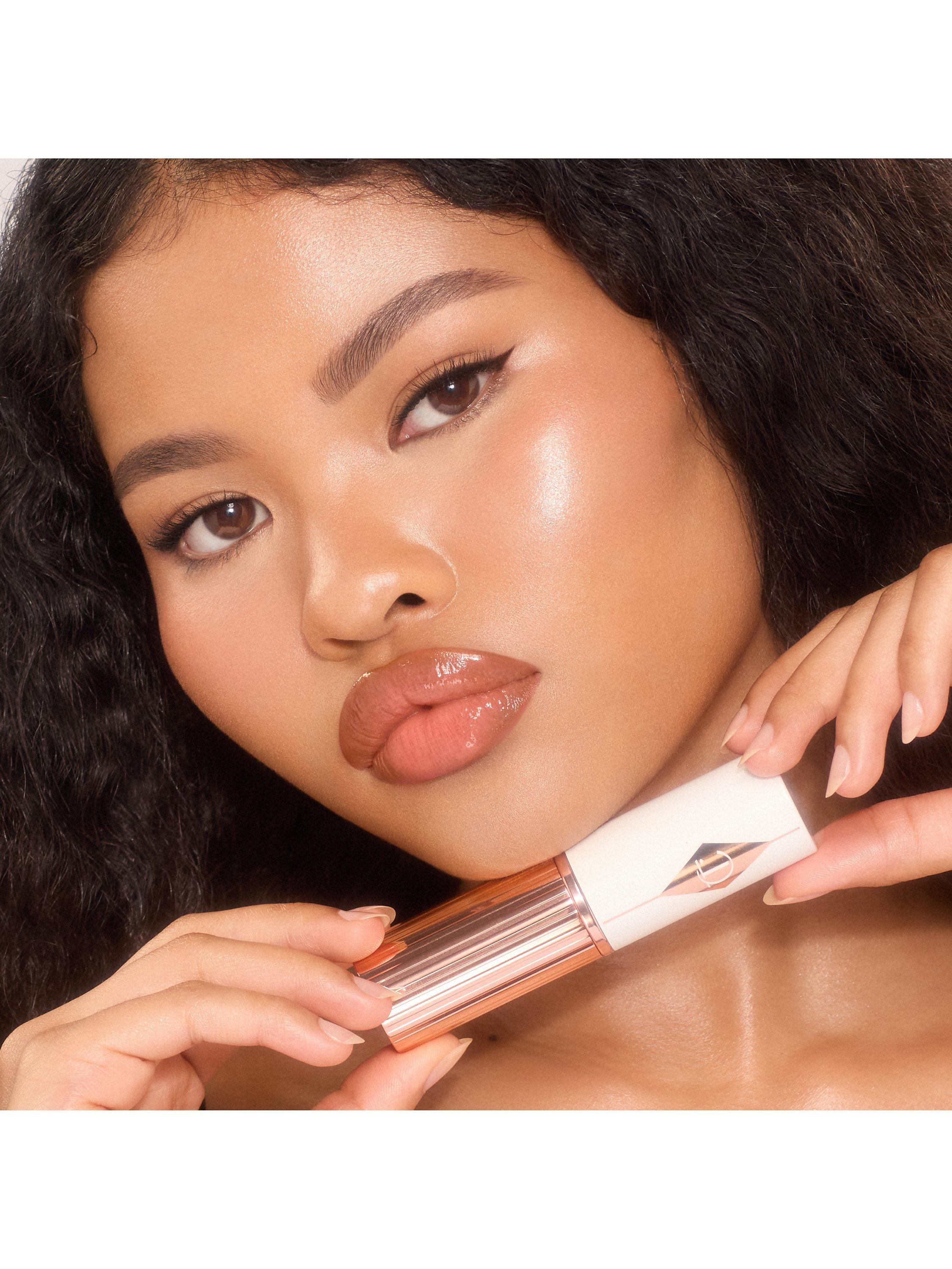 Product image 5 of 8, which shows Charlotte Tilbury Unreal Skin Foundation Stick, 8 Medium