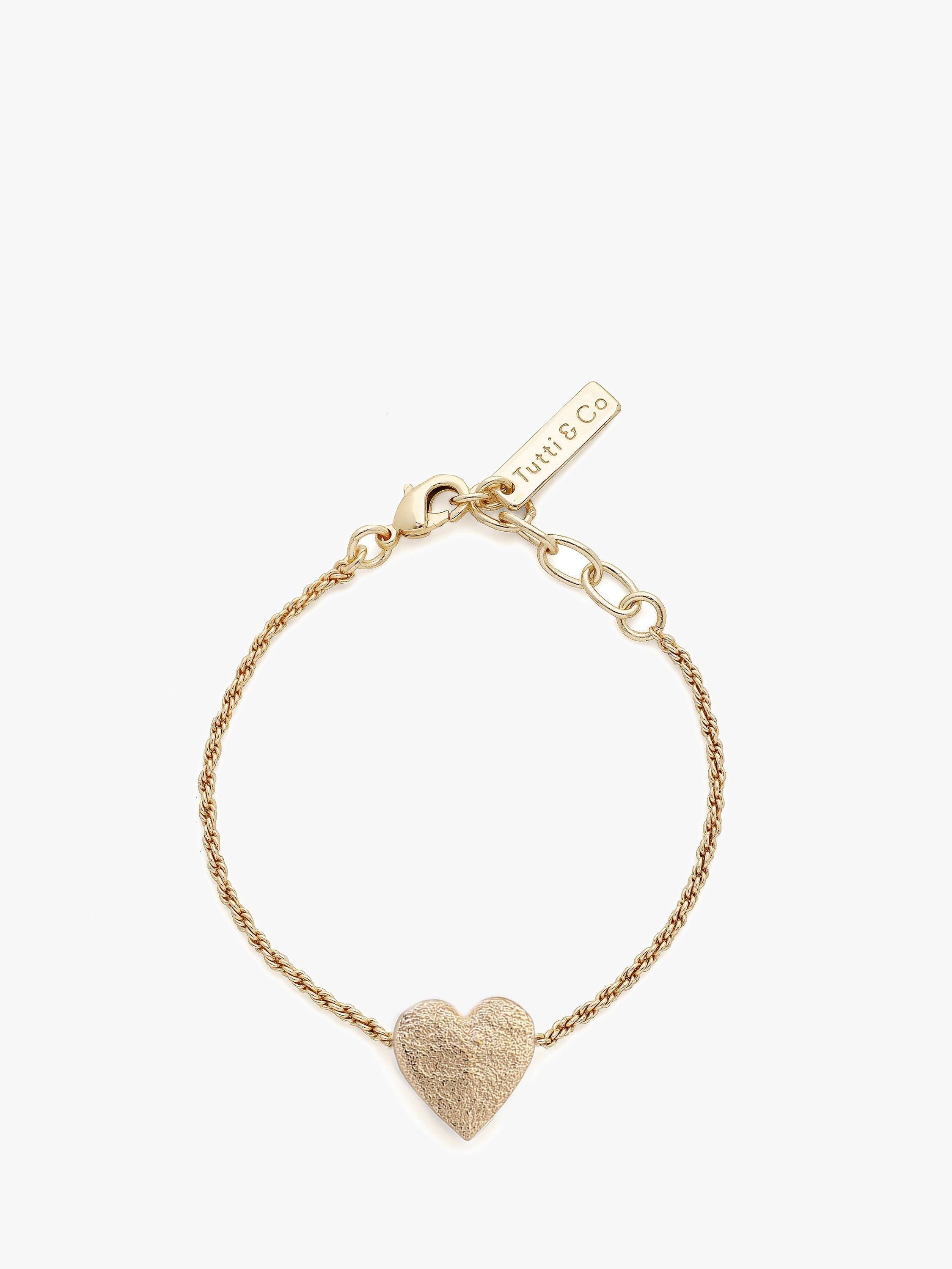 Product image 1 of 6, which shows Tutti & Co Embrace Textured Heart Chain Bracelet, Gold