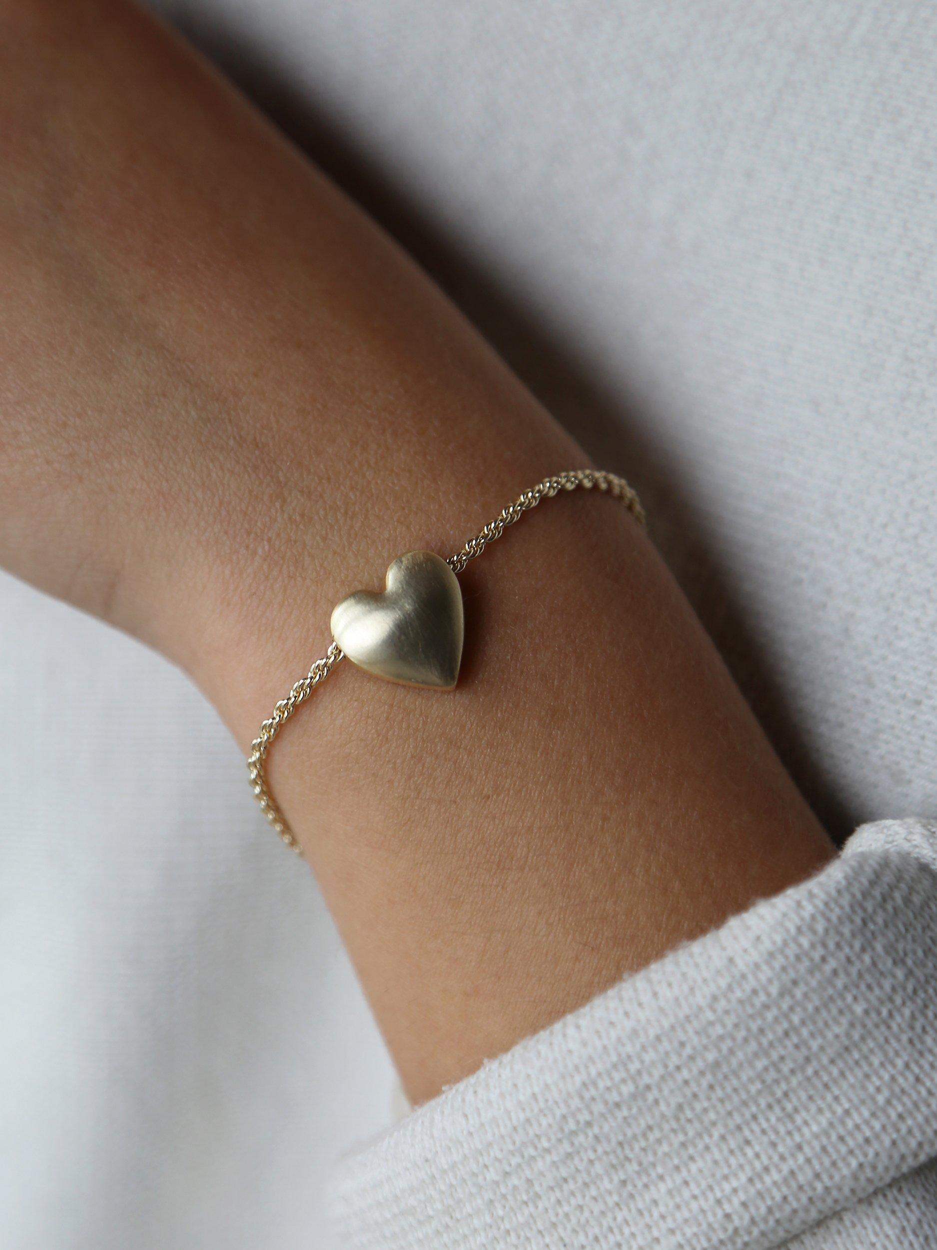 Product image 5 of 6, which shows Tutti & Co Embrace Textured Heart Chain Bracelet, Gold