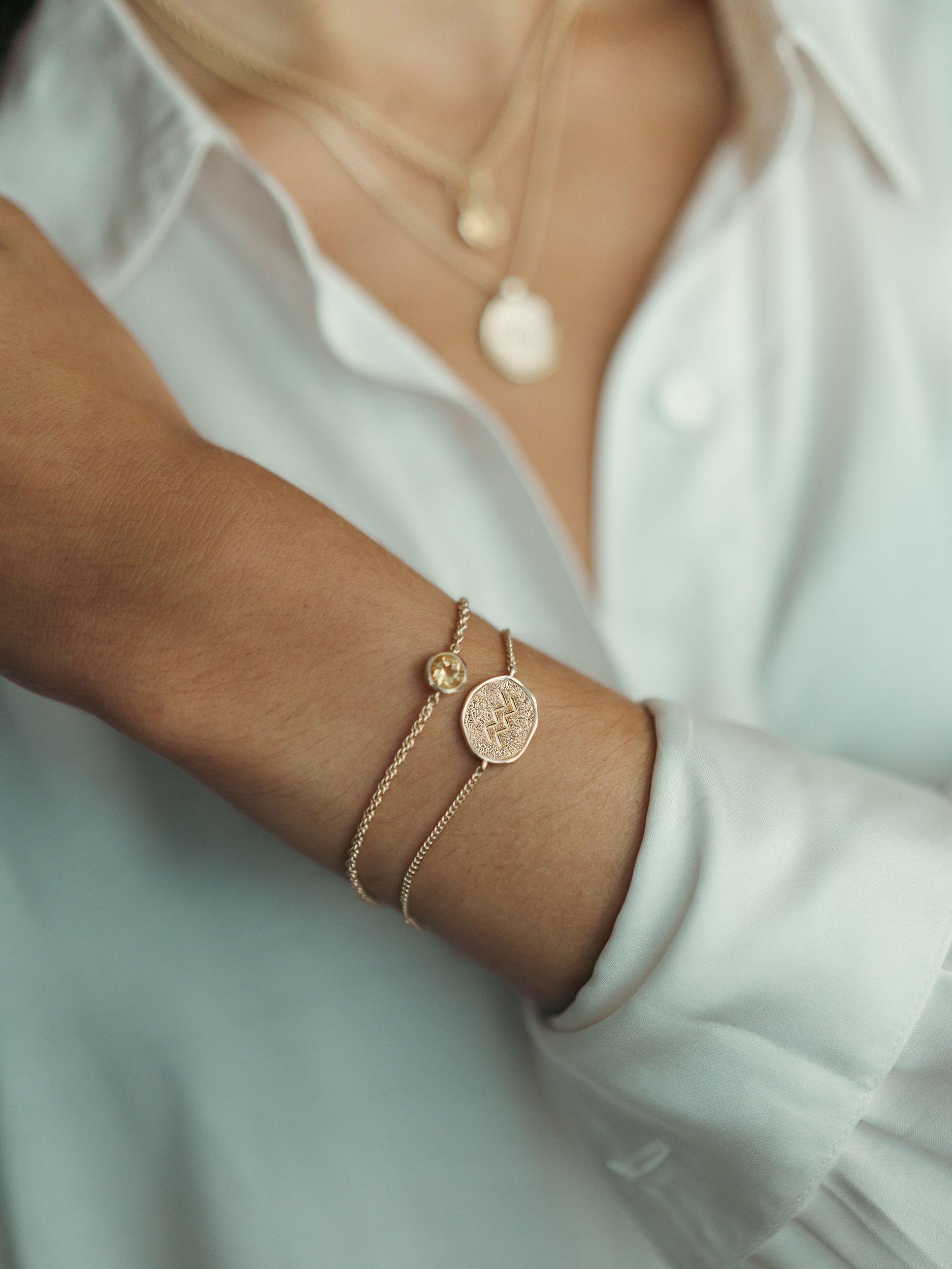 Product image 2 of 4, which shows Tutti & Co Zodiac Charm Chain Bracelet, Gold, Aquarius