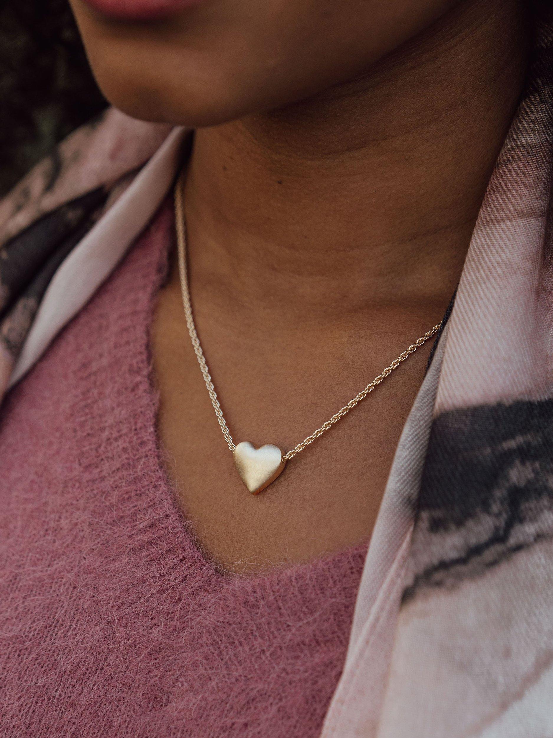Product image 3 of 6, which shows Tutti & Co Embrace Textured Heart Chain Necklace, Gold