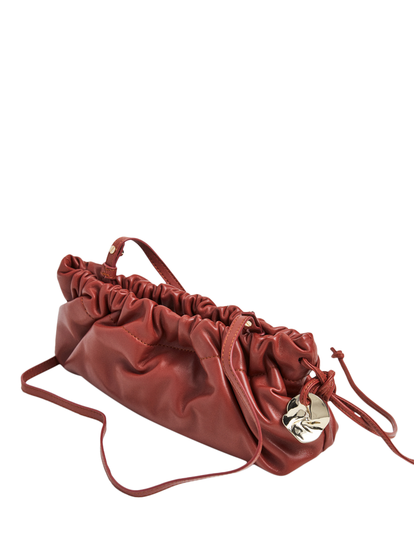 Product image 3 of 6, which shows Flattered Cissi Leather Ruched Clutch Bag, Brick