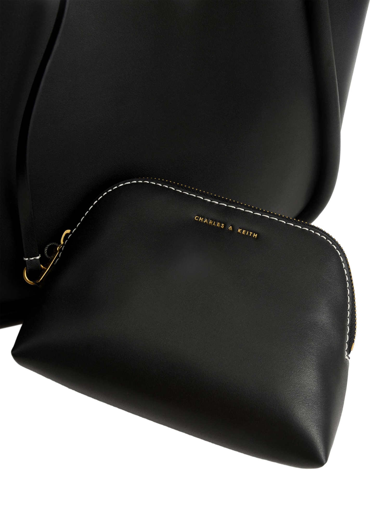 Product image 4 of 7, which shows CHARLES & KEITH Tubular Slouchy Faux Leather Tote Bag, Black