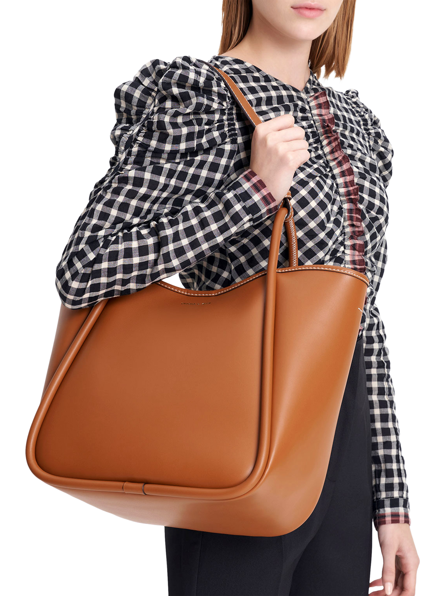 Product image 6 of 7, which shows CHARLES & KEITH Faux Leather Tub Slouchy Shoulder Bag, Cognac