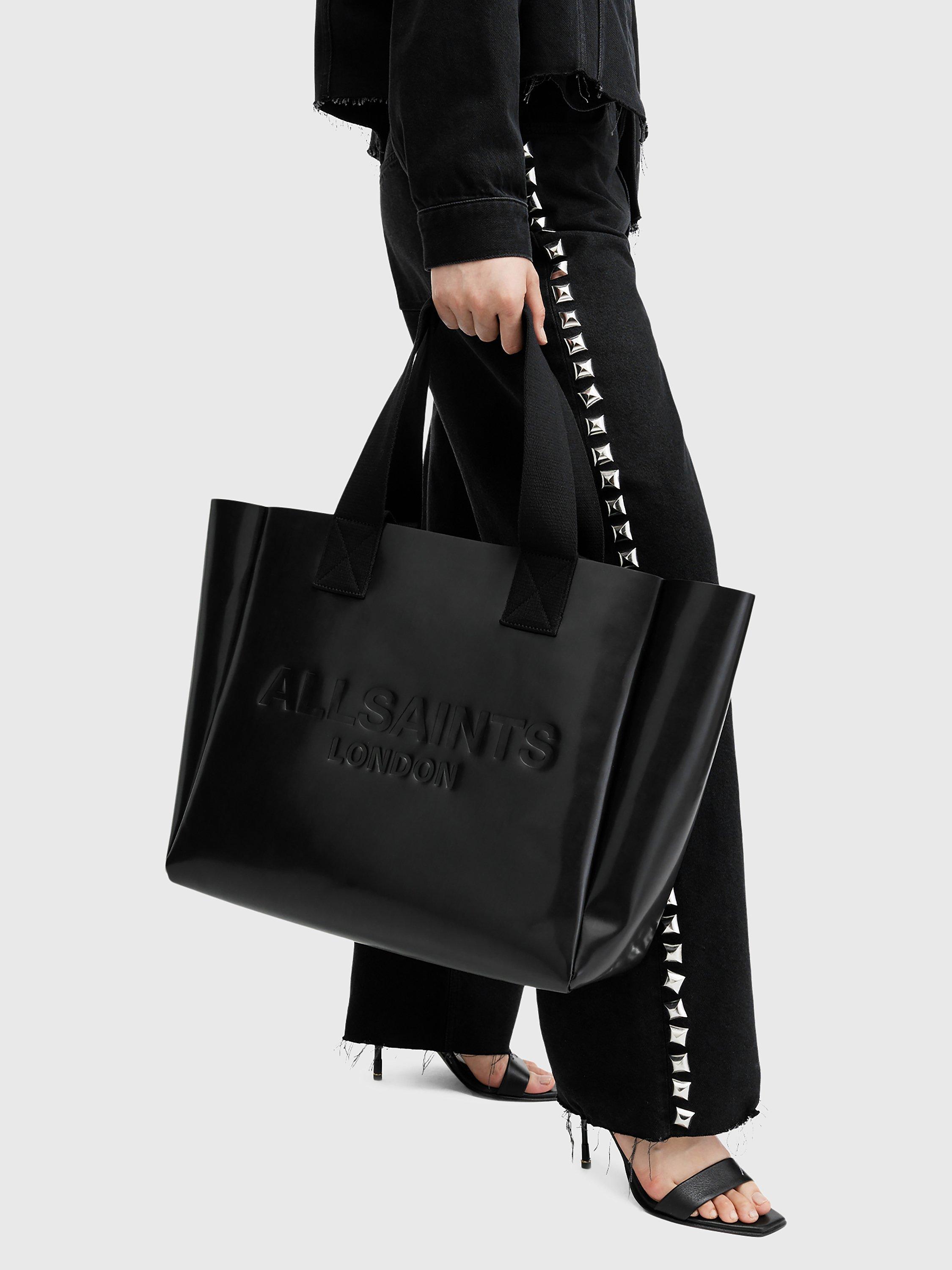 Product image 4 of 7, which shows AllSaints Izzy Leather Tote Bag, Black