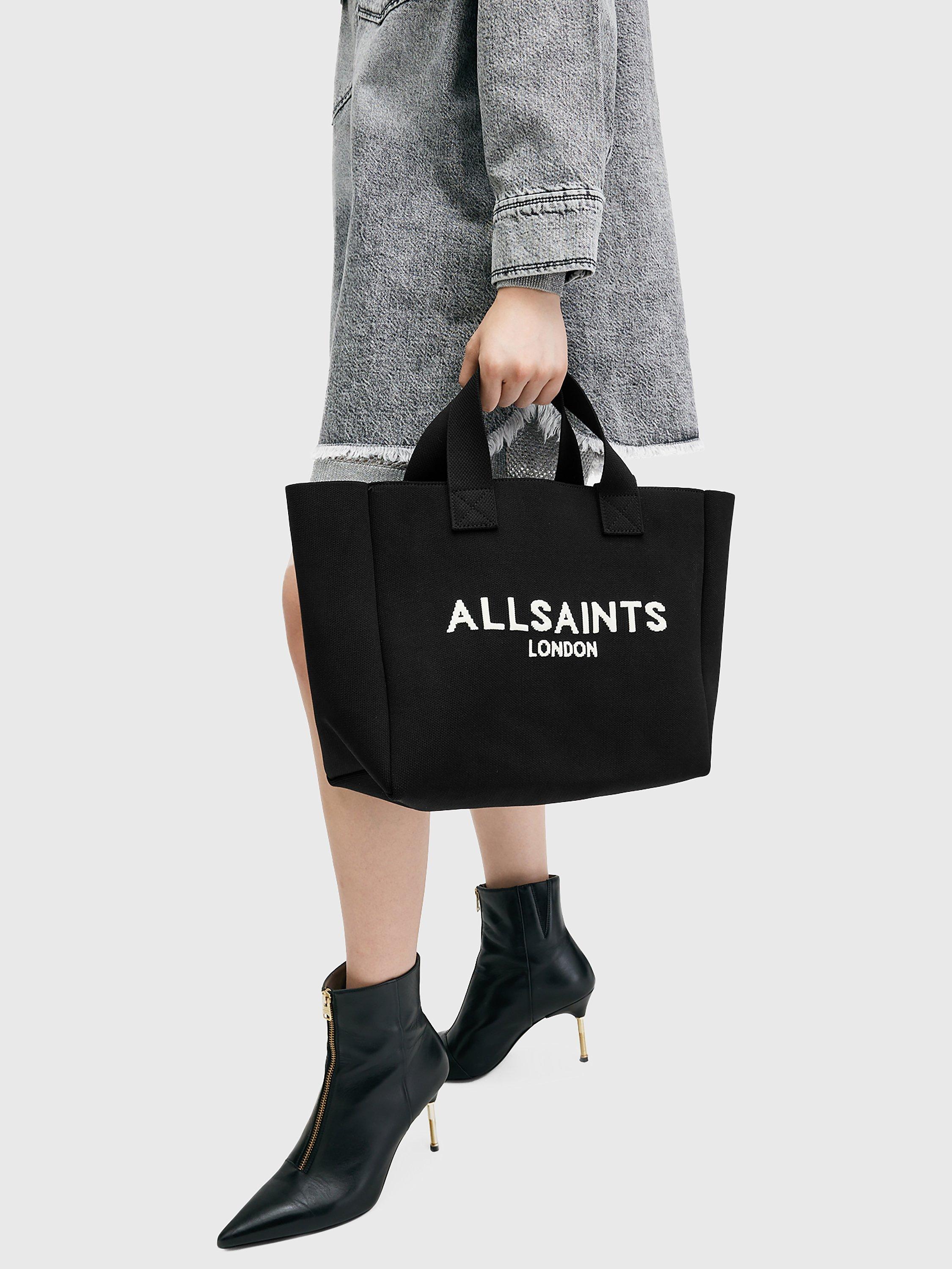 Product image 2 of 6, which shows AllSaints Izzy Tote Bag, Black