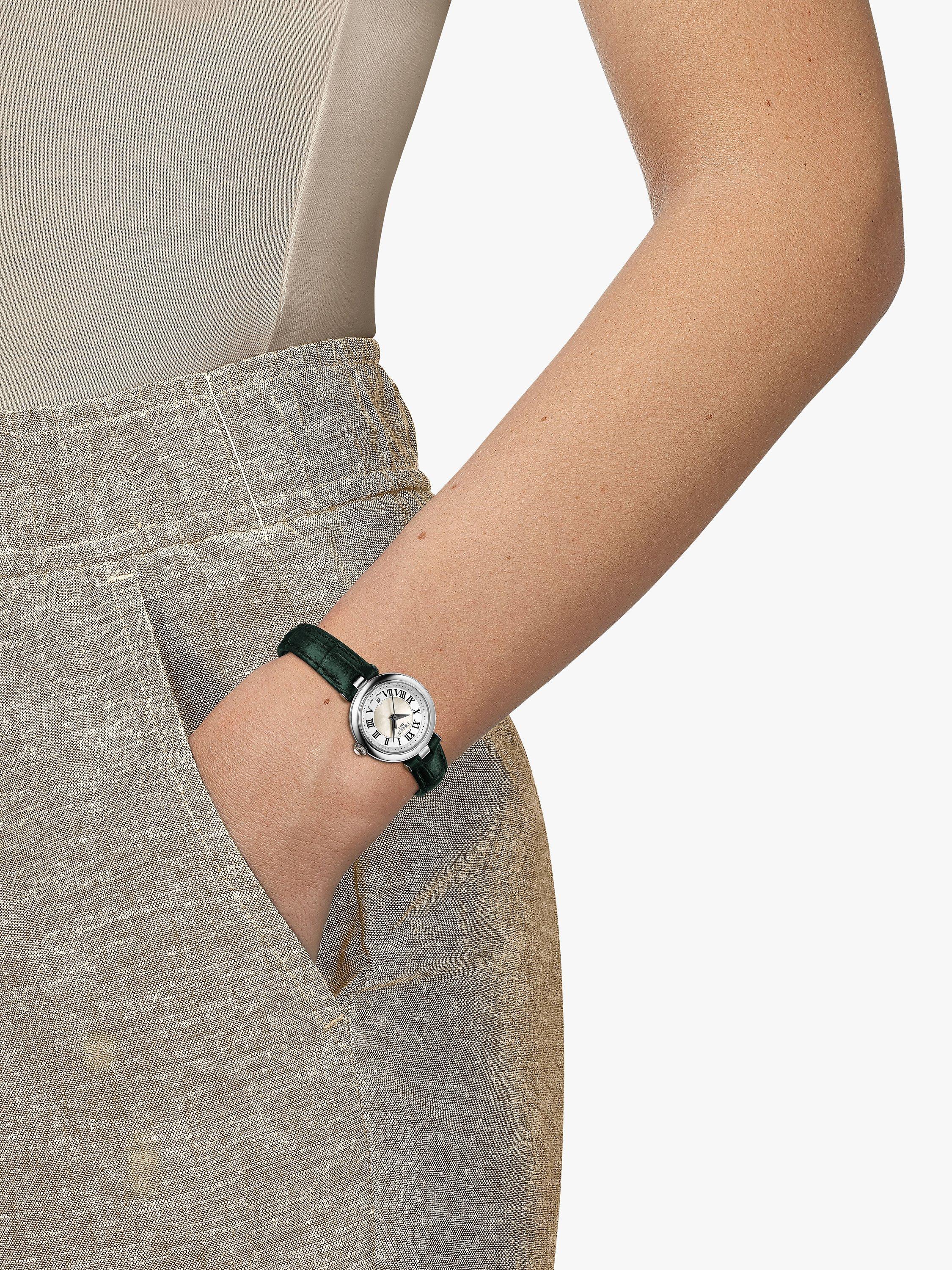 Product image 2 of 4, which shows Tissot T1260101611302 Women's Bellissima Date Metal Strap Watch, Dark Green/Silver
