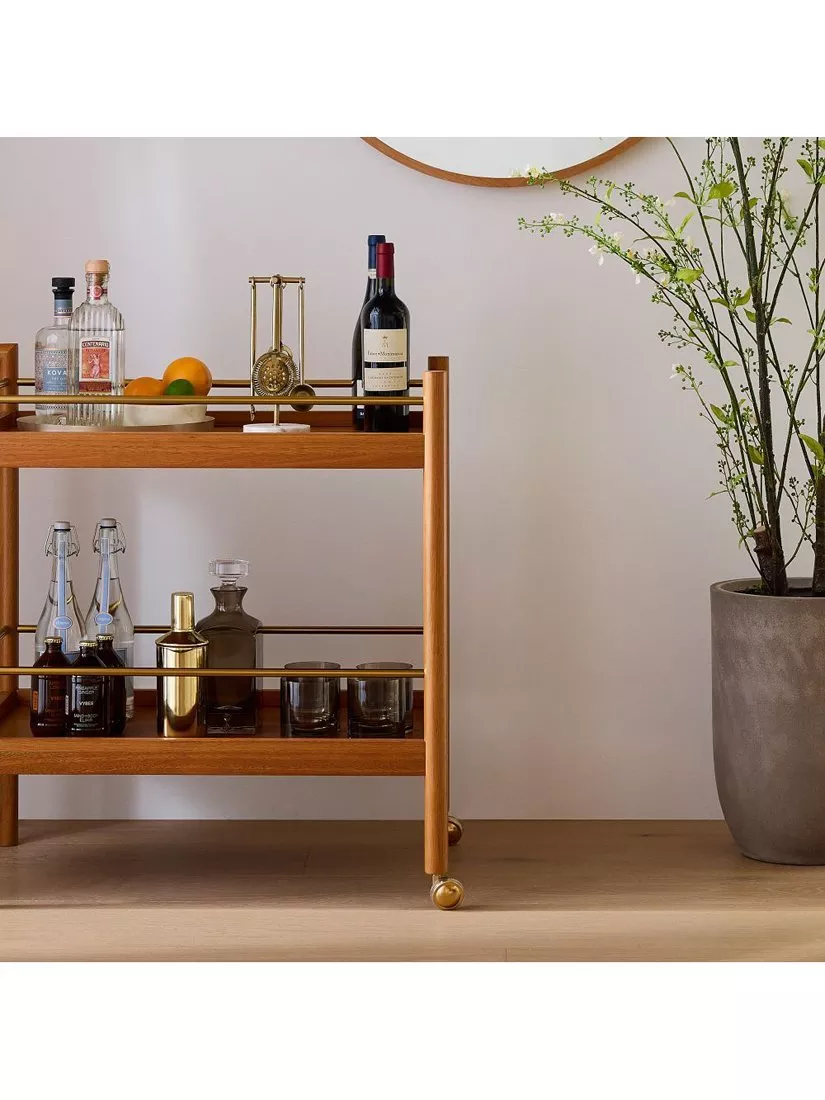 trolley with glasses and bowls on