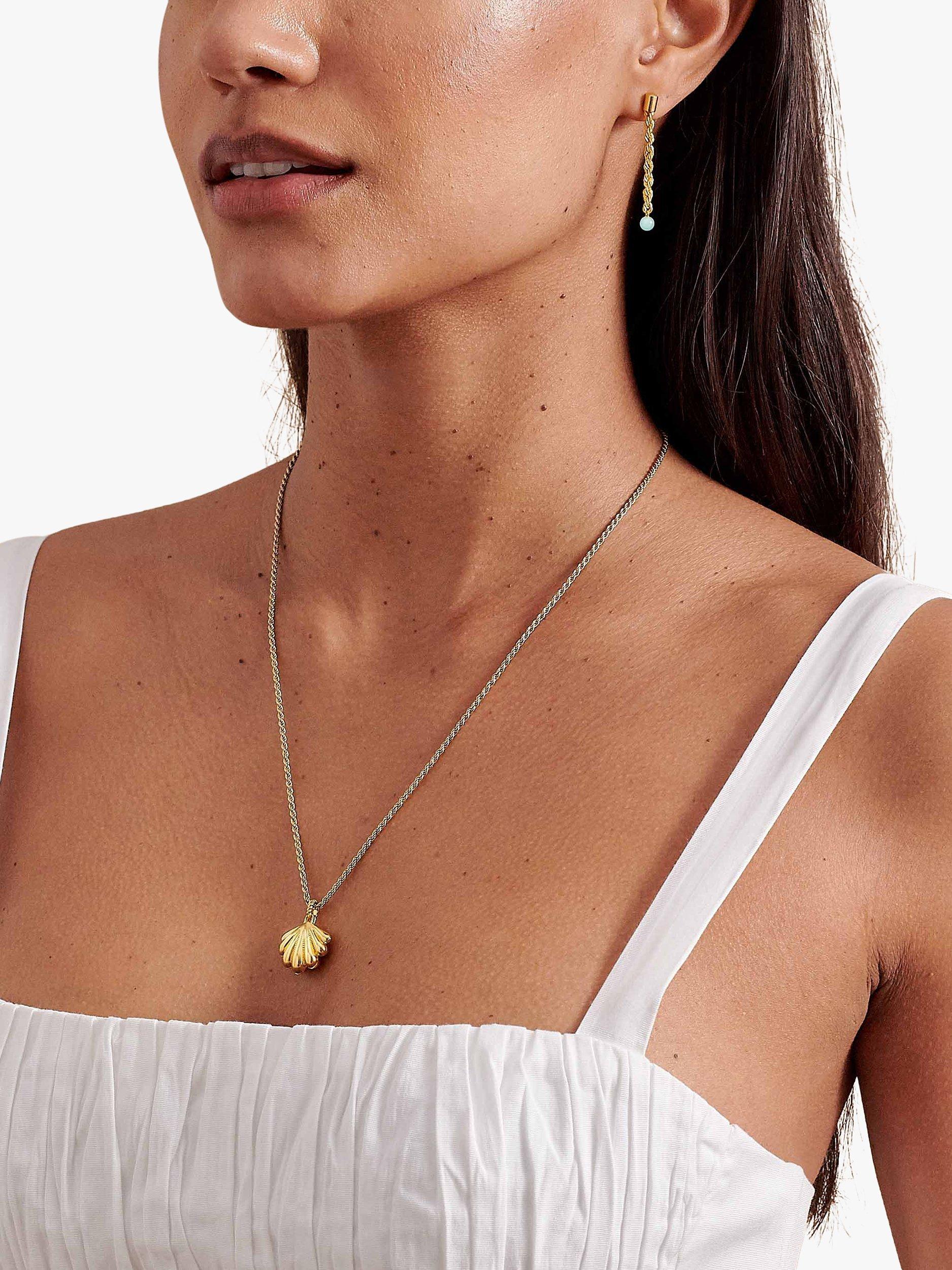 Product image 2 of 8, which shows Edge of Ember Summer Laguna Shell Locket Necklace, Gold