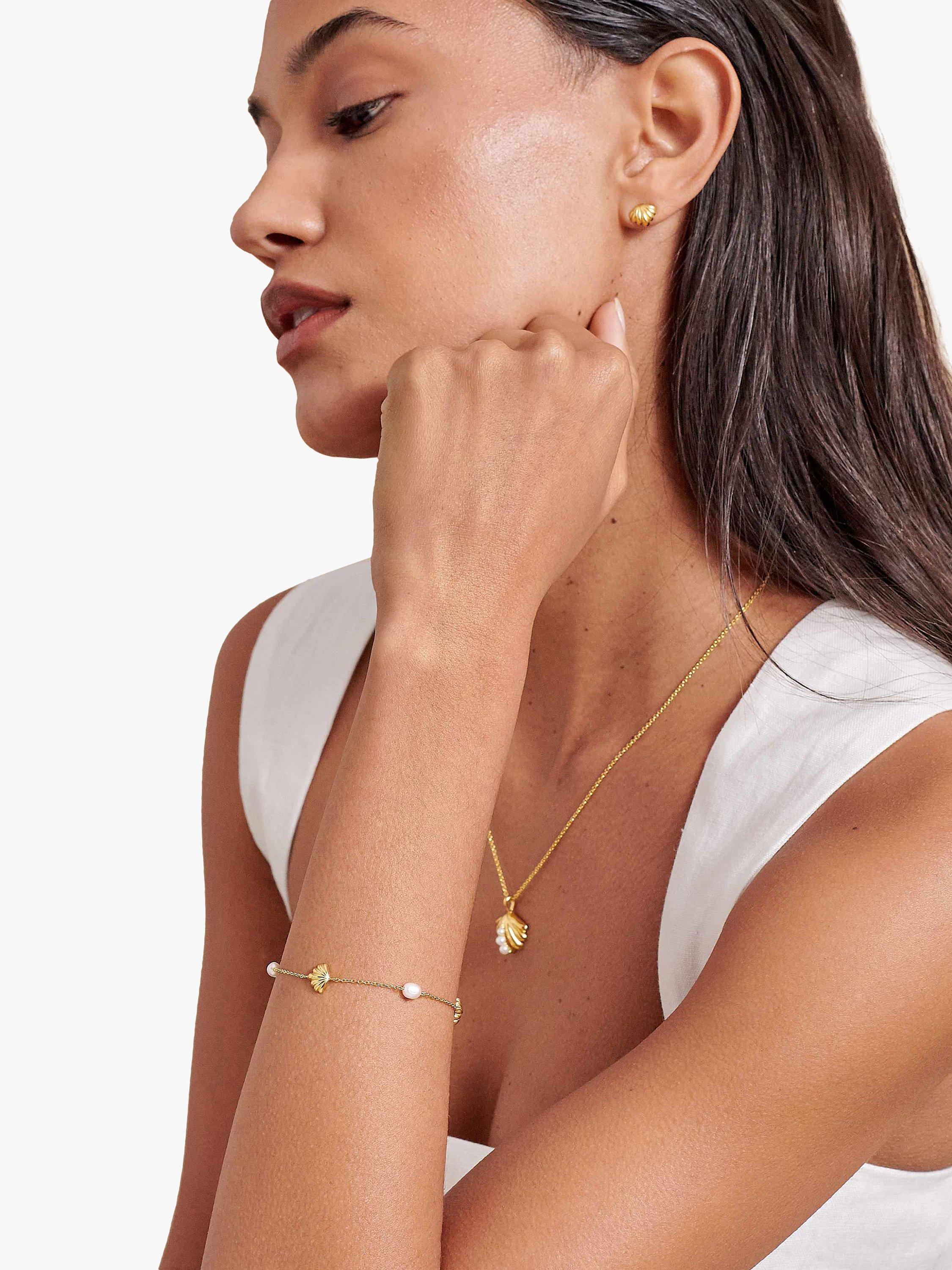 Product image 2 of 7, which shows Edge of Ember Pearl Charm Bracelet, Yellow Gold