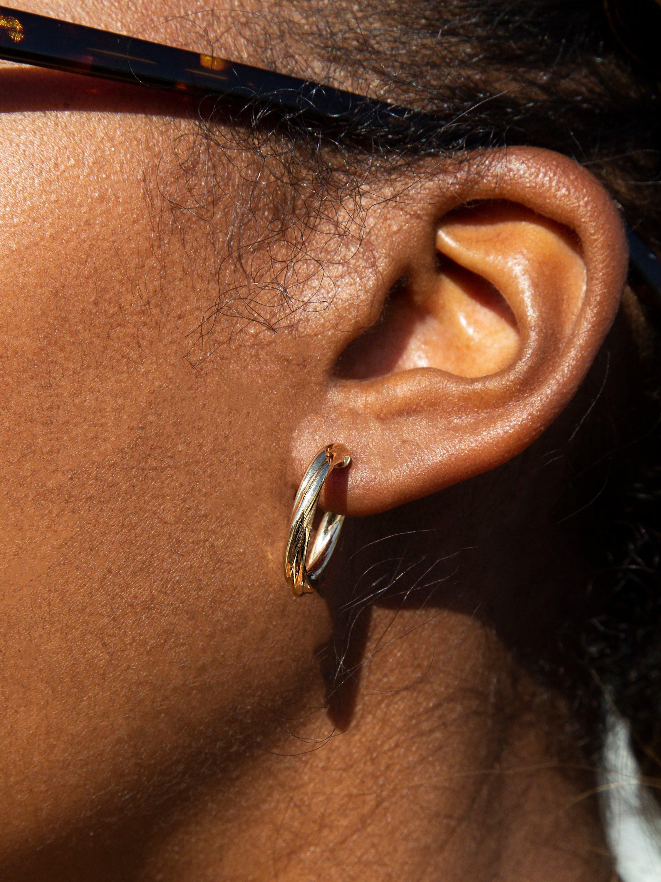 Product image 2 of 5, which shows IBB 18ct Yellow Gold Hollow Twisted Tube Earrings, Gold