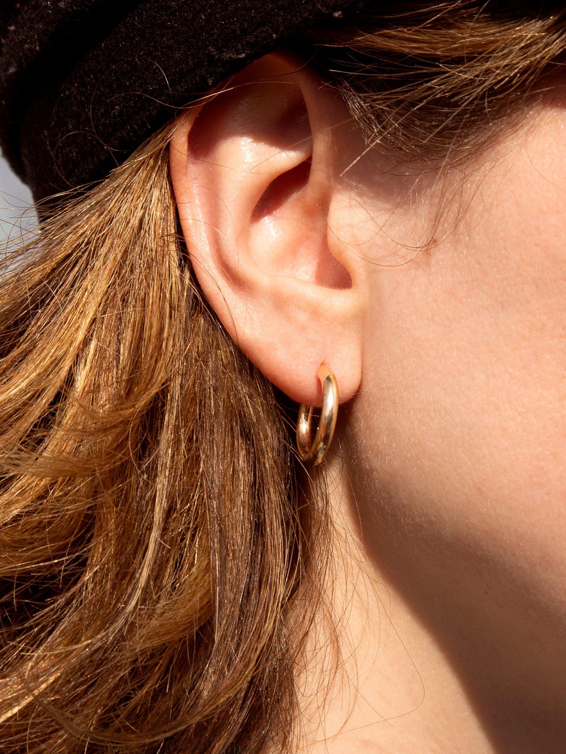 Product image 2 of 5, which shows IBB 18ct Yellow Gold Polished Creole Earrings, Gold