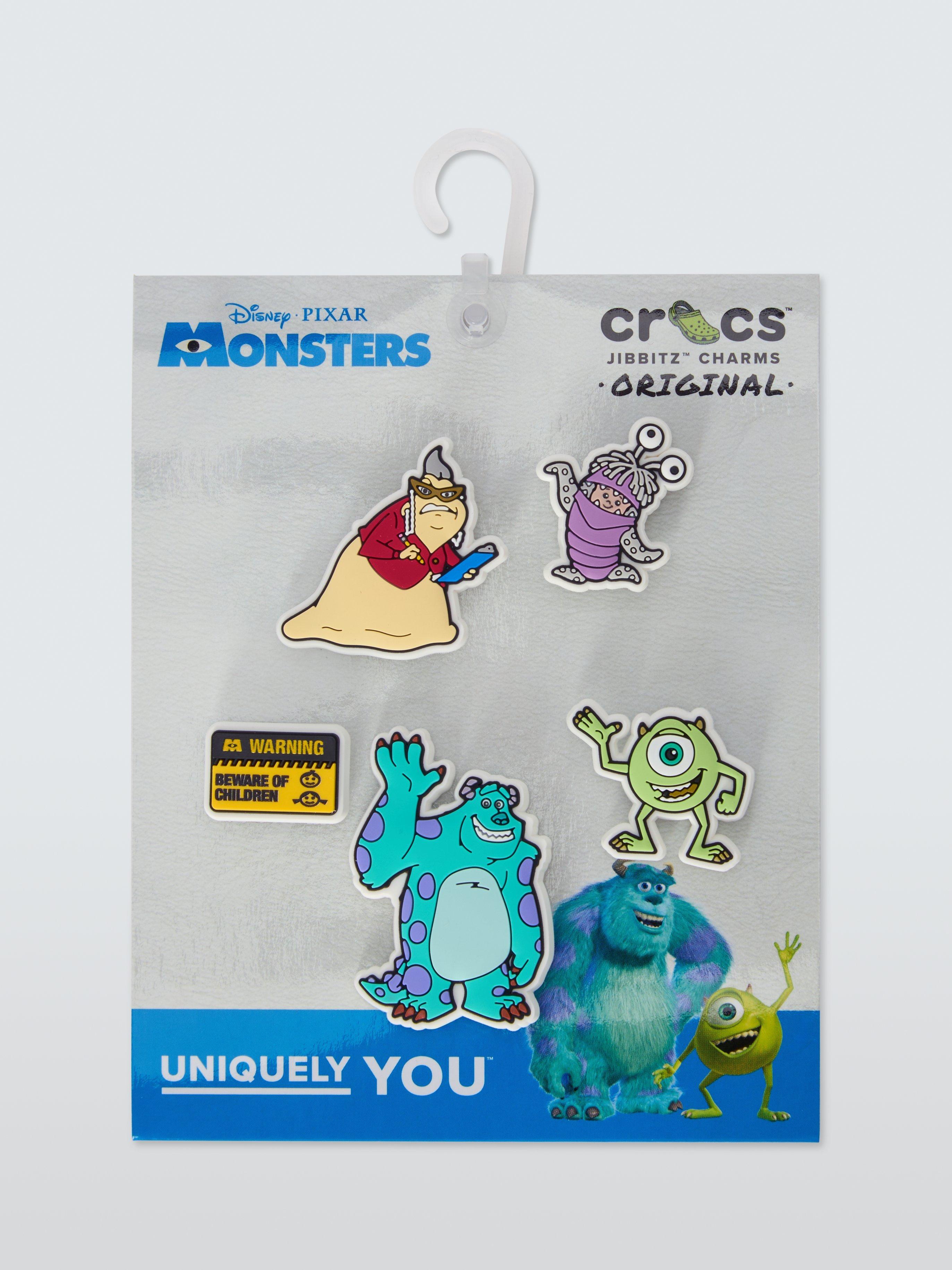 Product image 1 of 2, which shows Crocs Kids' Monsters Inc Jibbitz, Pack of 5, Multi