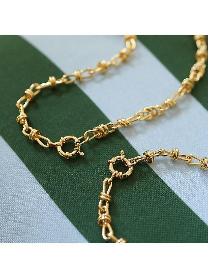 Product image 2 of 3, which shows Daisy London Daisy x Polly Sayer Knot Chain Necklace, Gold