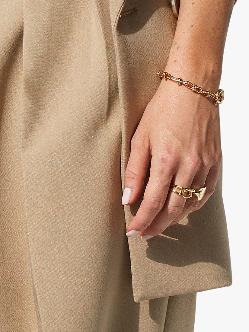 Product image 3 of 3, which shows Daisy London Daisy x Polly Sayer Knot Chain Bracelet, Gold