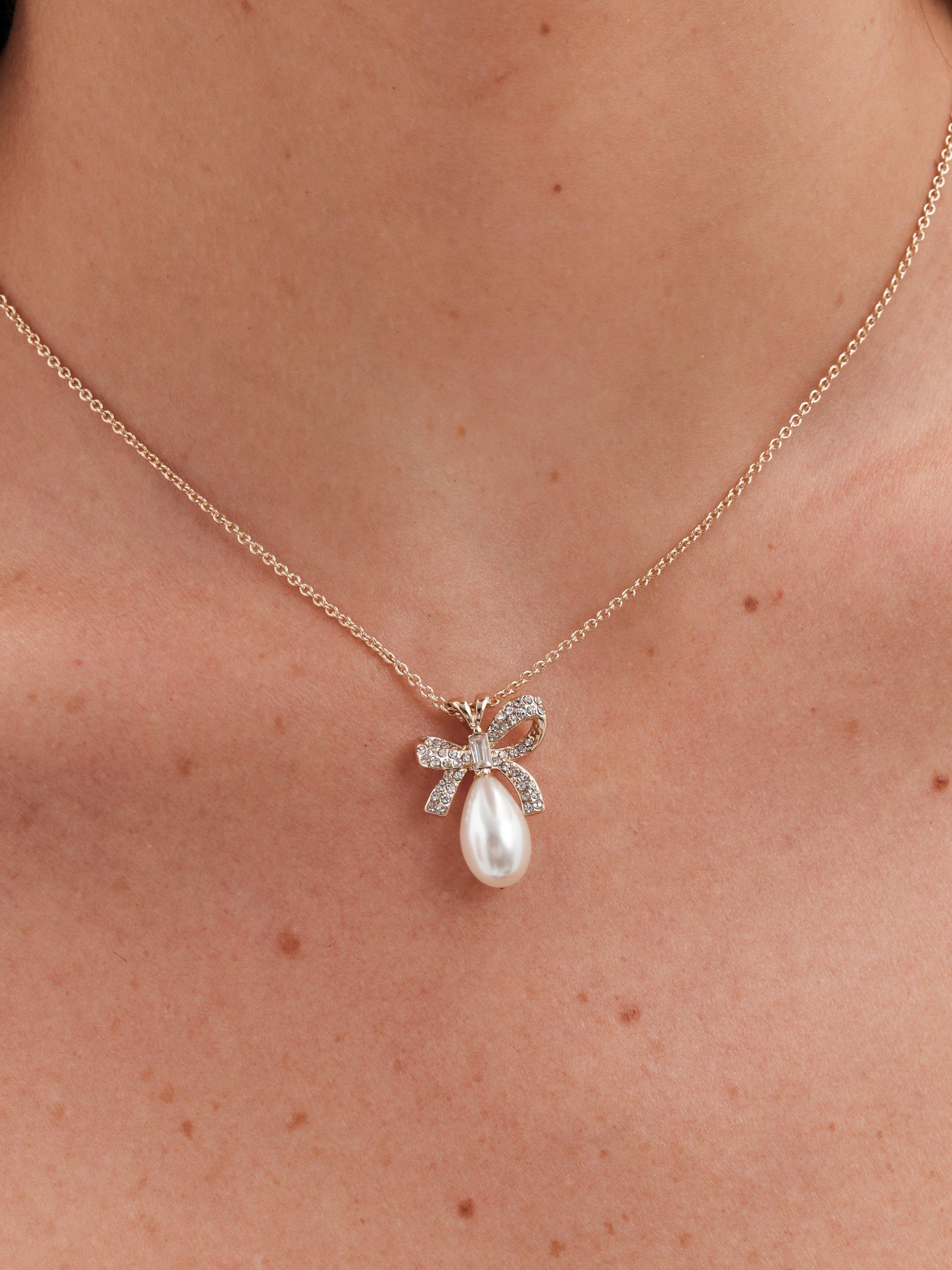Product image 3 of 5, which shows Jon Richard Crystal Bow And Pearl Earrings, Pendant Necklace and Bracelet Set, Silver