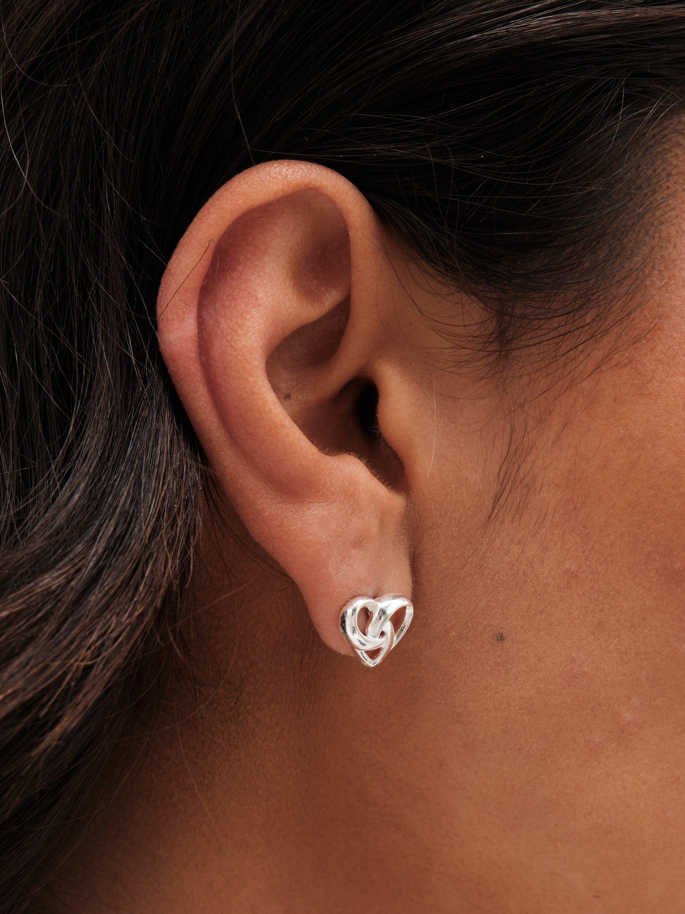 Product image 4 of 4, which shows Simply Silver Heart Knot Stud Earrings, Silver