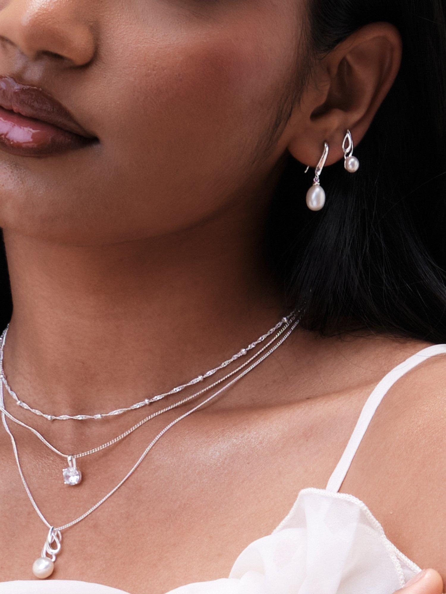 Product image 2 of 3, which shows Simply Silver Polished & Pearl Swirl Earrings, Silver