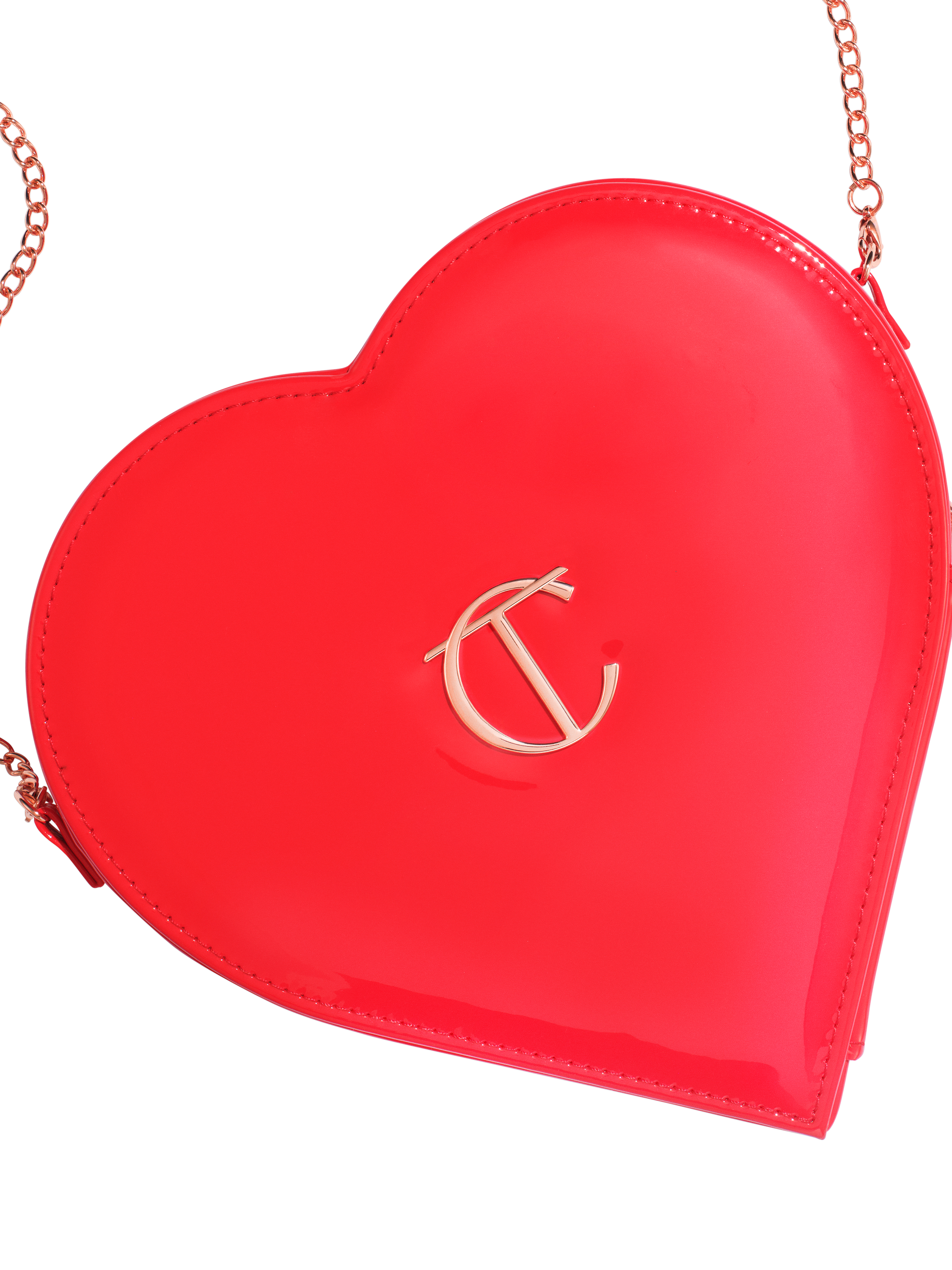Product image 1 of 4, which shows Charlotte Tilbury Limited Edition L.O.V.E. Makeup Bag, Red