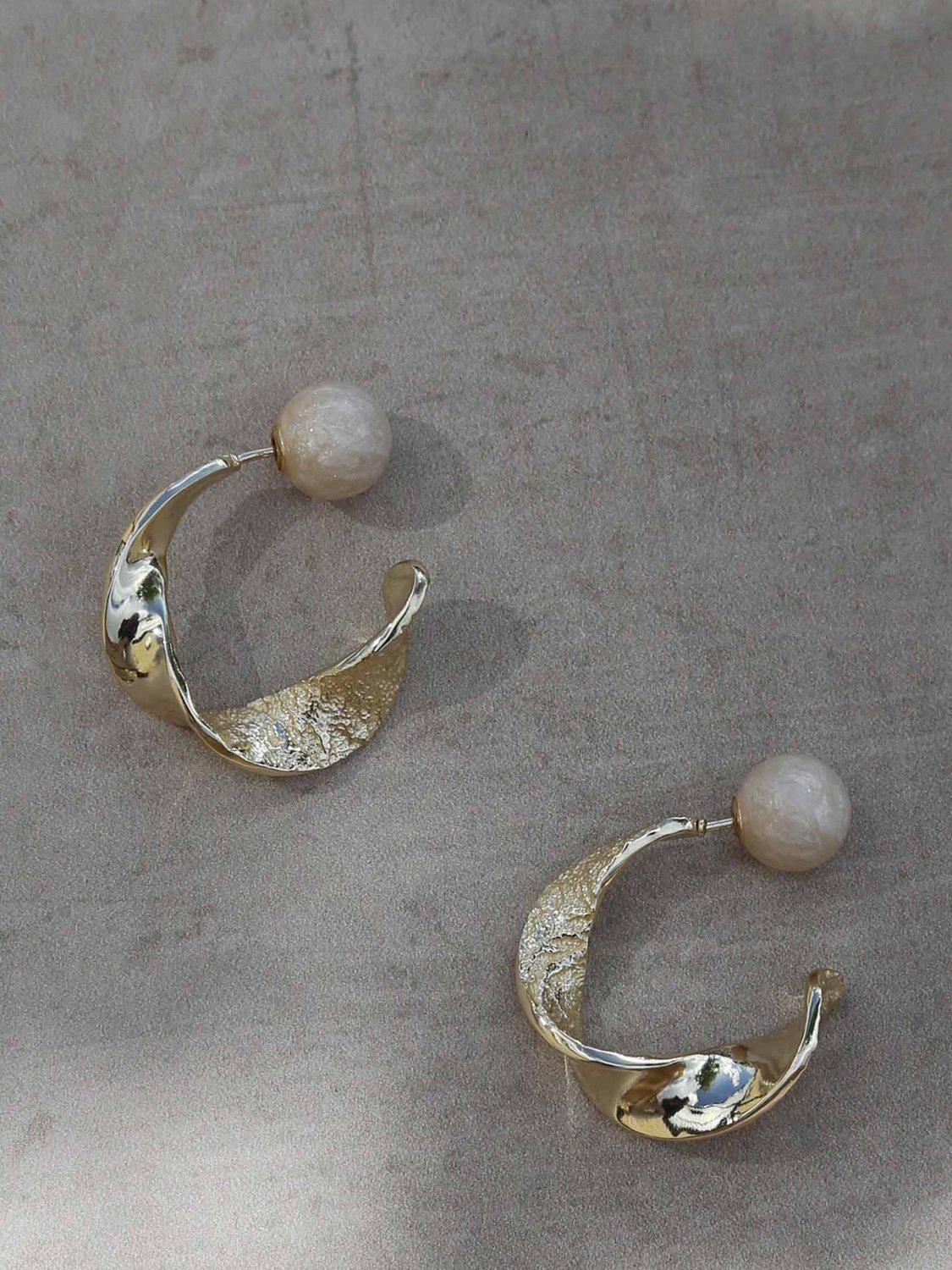 Product image 5 of 7, which shows Tutti Convent 20th Anniversary Twisted Hoop Earrings, Gold