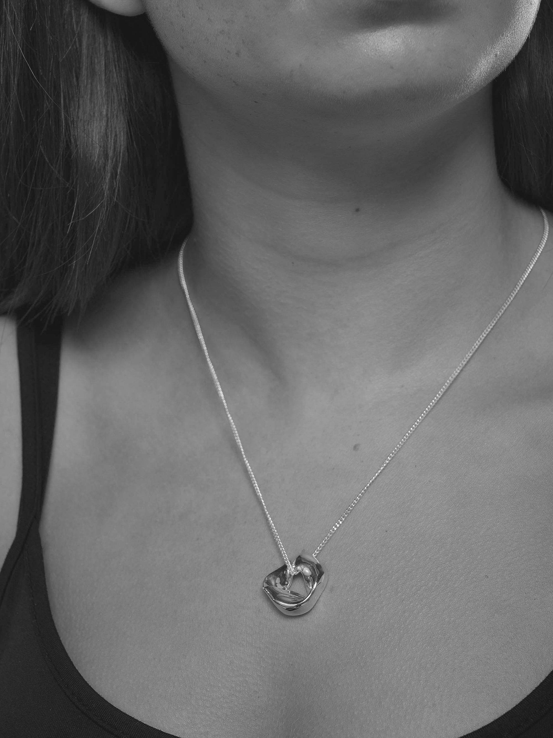 Product image 2 of 5, which shows Tutti & Co Soho 20th Anniversary Scrunched Circle Pendant Necklace, Silver