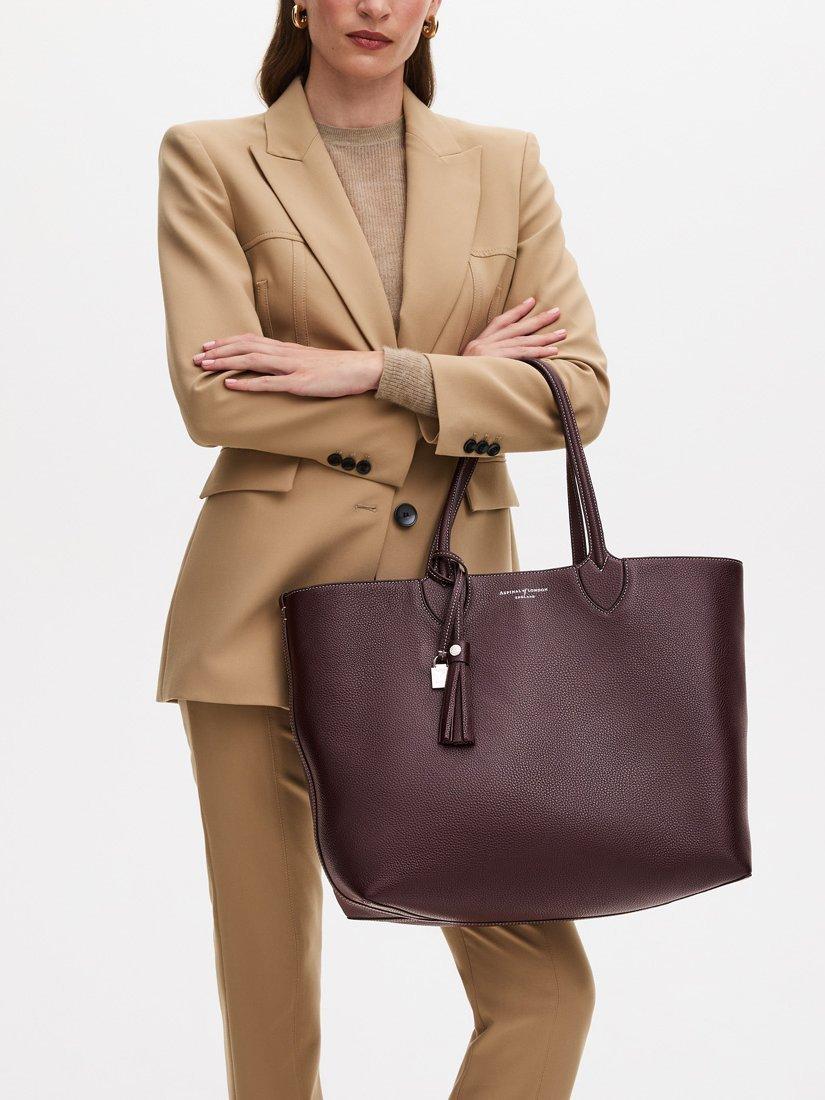 Product image 7 of 8, which shows Aspinal of London Hudson Small Grain Milled Pebble Leather Oversized Tote Bag, Wine