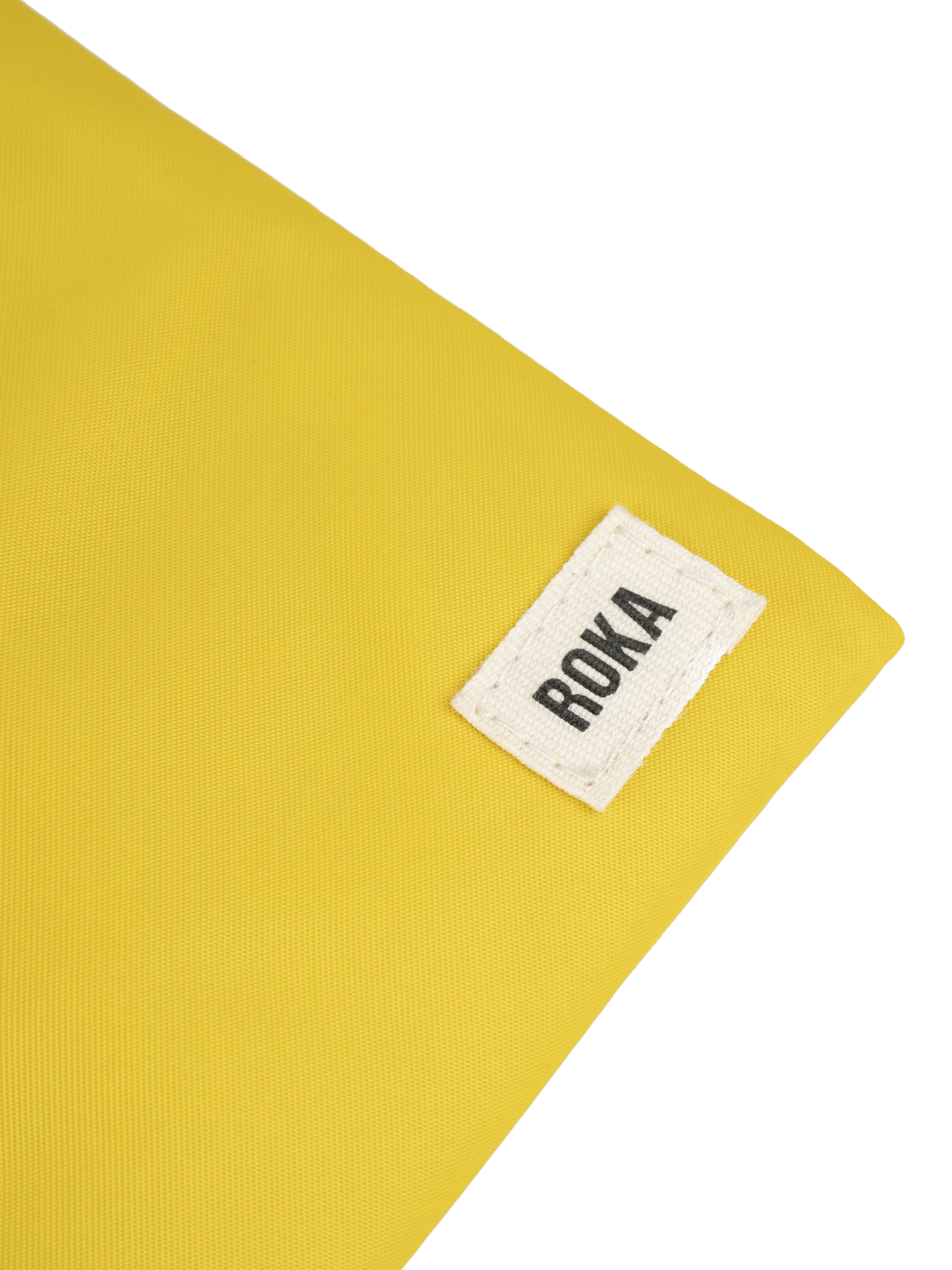 Product image 6 of 6, which shows ROKA London Chelsea Recycled Nylon Crossbody Pocket Bag, Mustard
