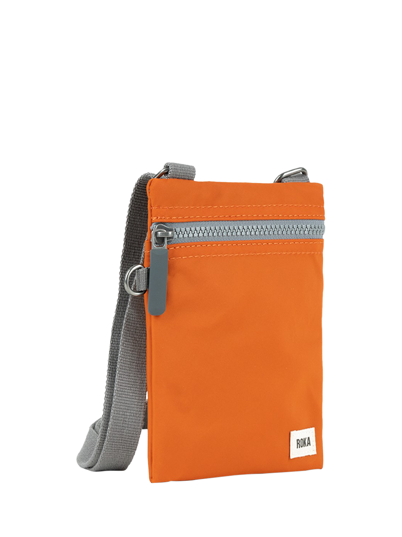 Product image 2 of 6, which shows ROKA London Chelsea Recycled Nylon Crossbody Pocket Bag, Burnt Orange