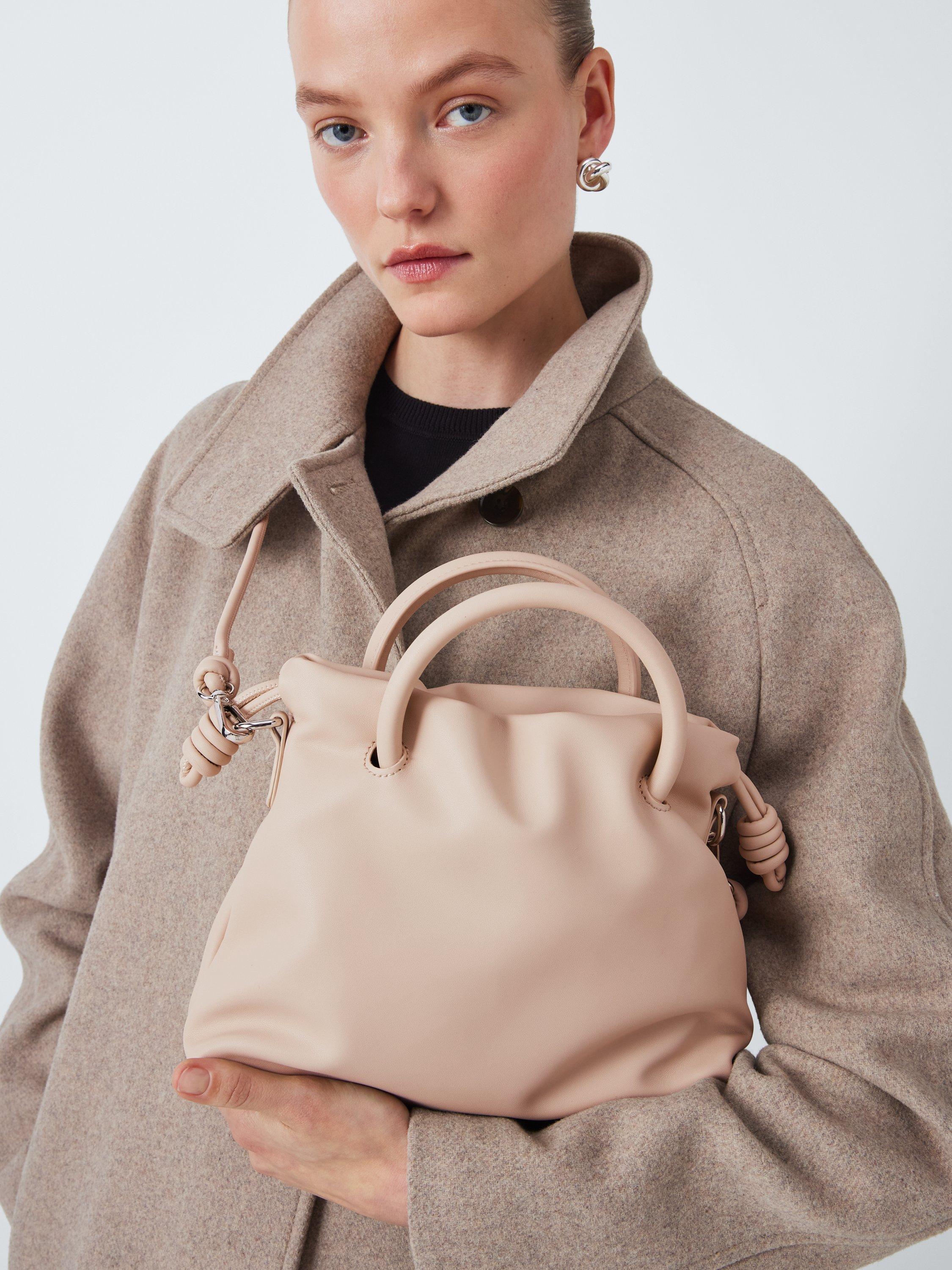 Product image 6 of 6, which shows John Lewis ANYDAY Faux Leather Drawstring Grab Bag, Off White