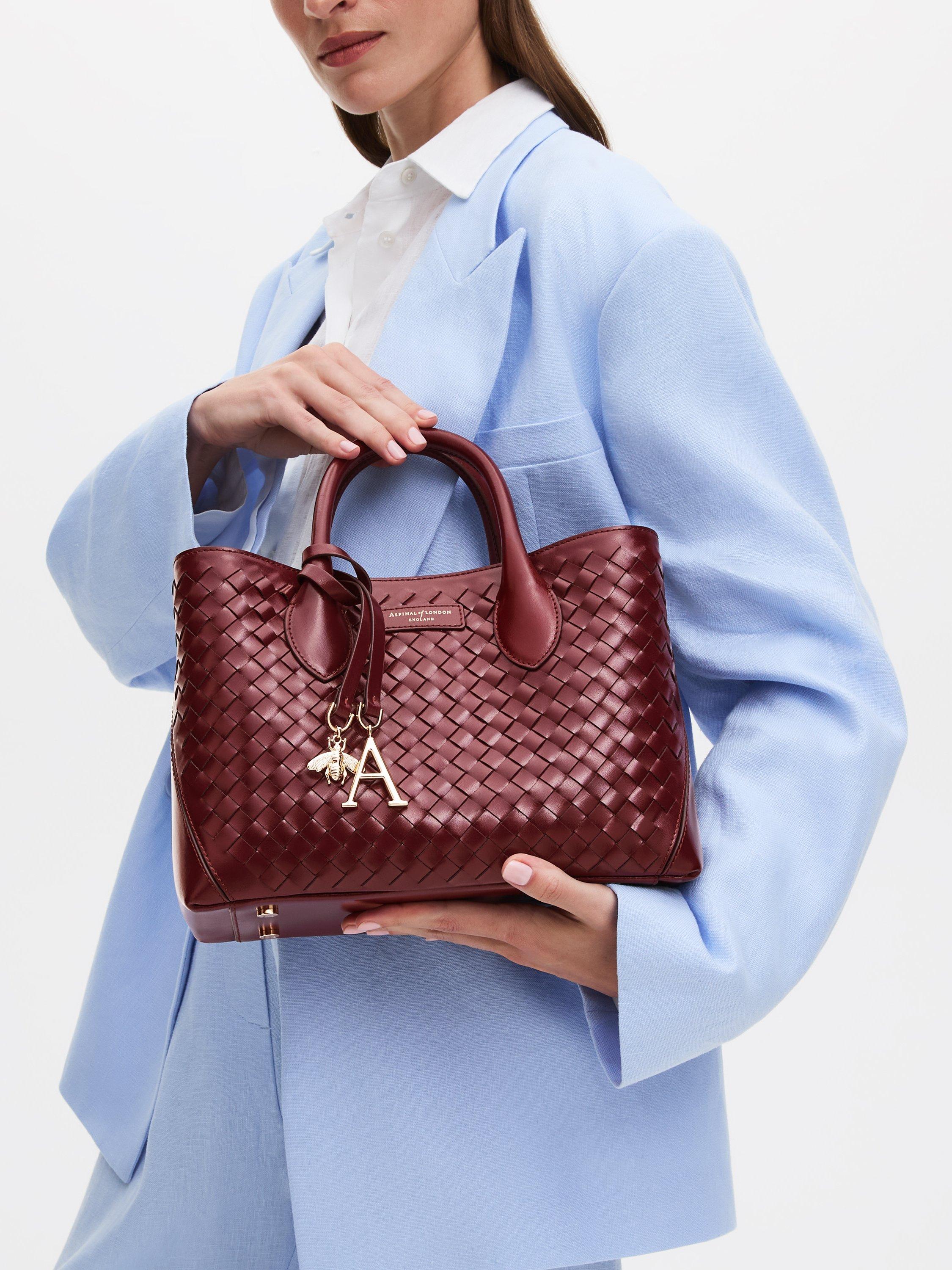 Product image 7 of 8, which shows Aspinal of London Slot Weave Leather London Midi Tote Bag, Burgundy