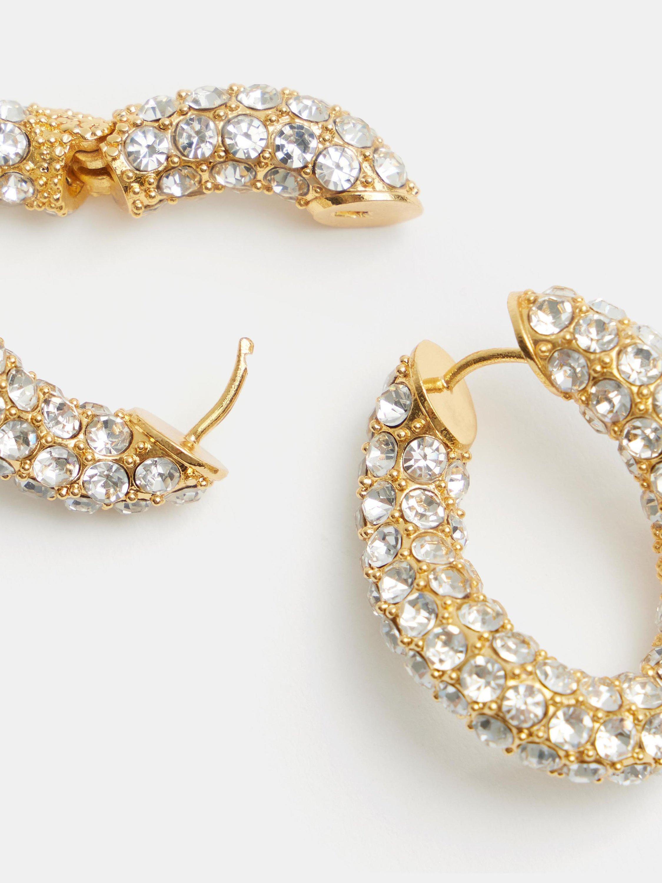 Product image 3 of 4, which shows HUSH Large Pia Crystal Pave Twist Hoop Earrings, Gold