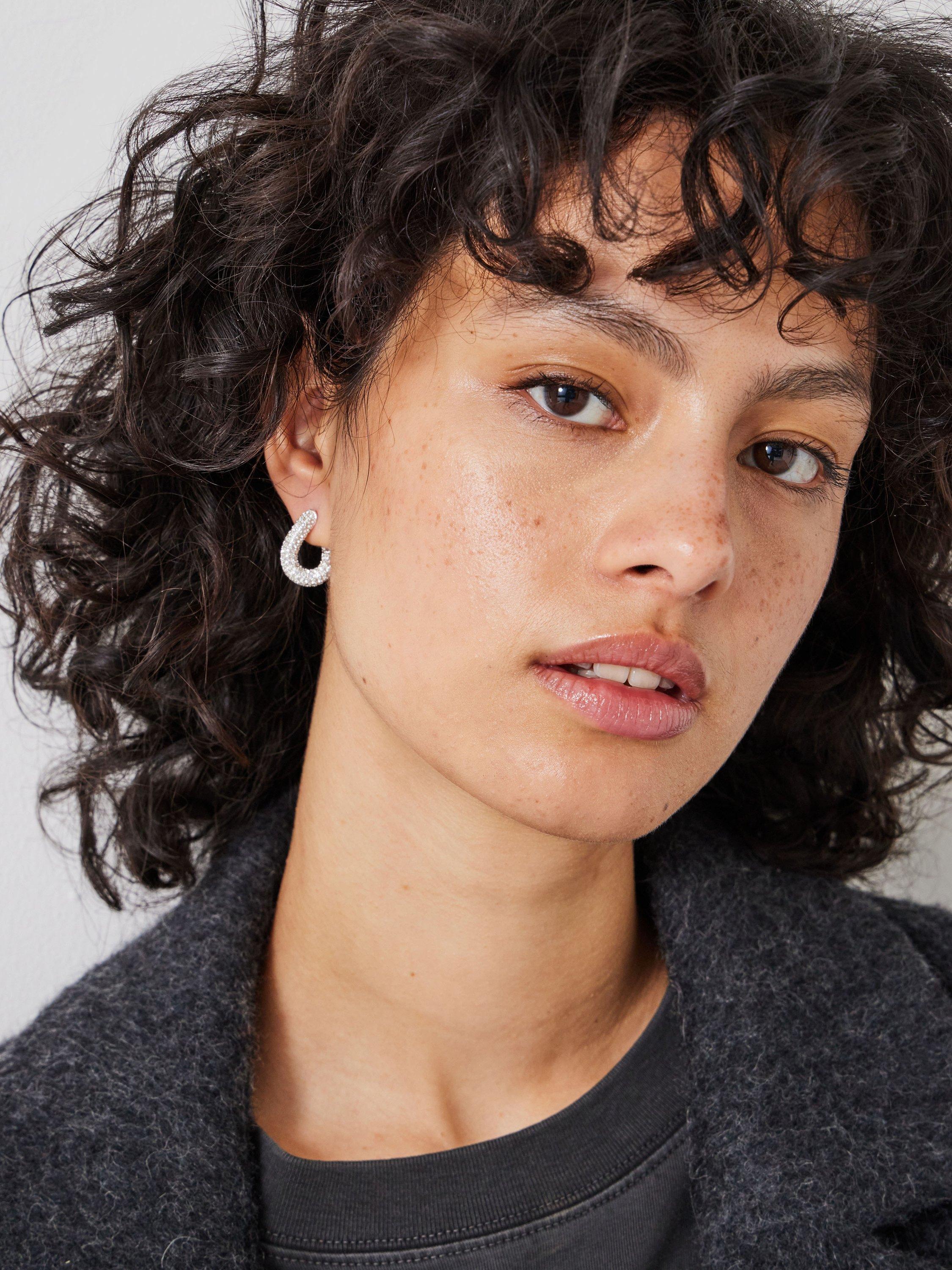 Product image 2 of 4, which shows HUSH Pia Pave Twist Hoop Earrings, Silver