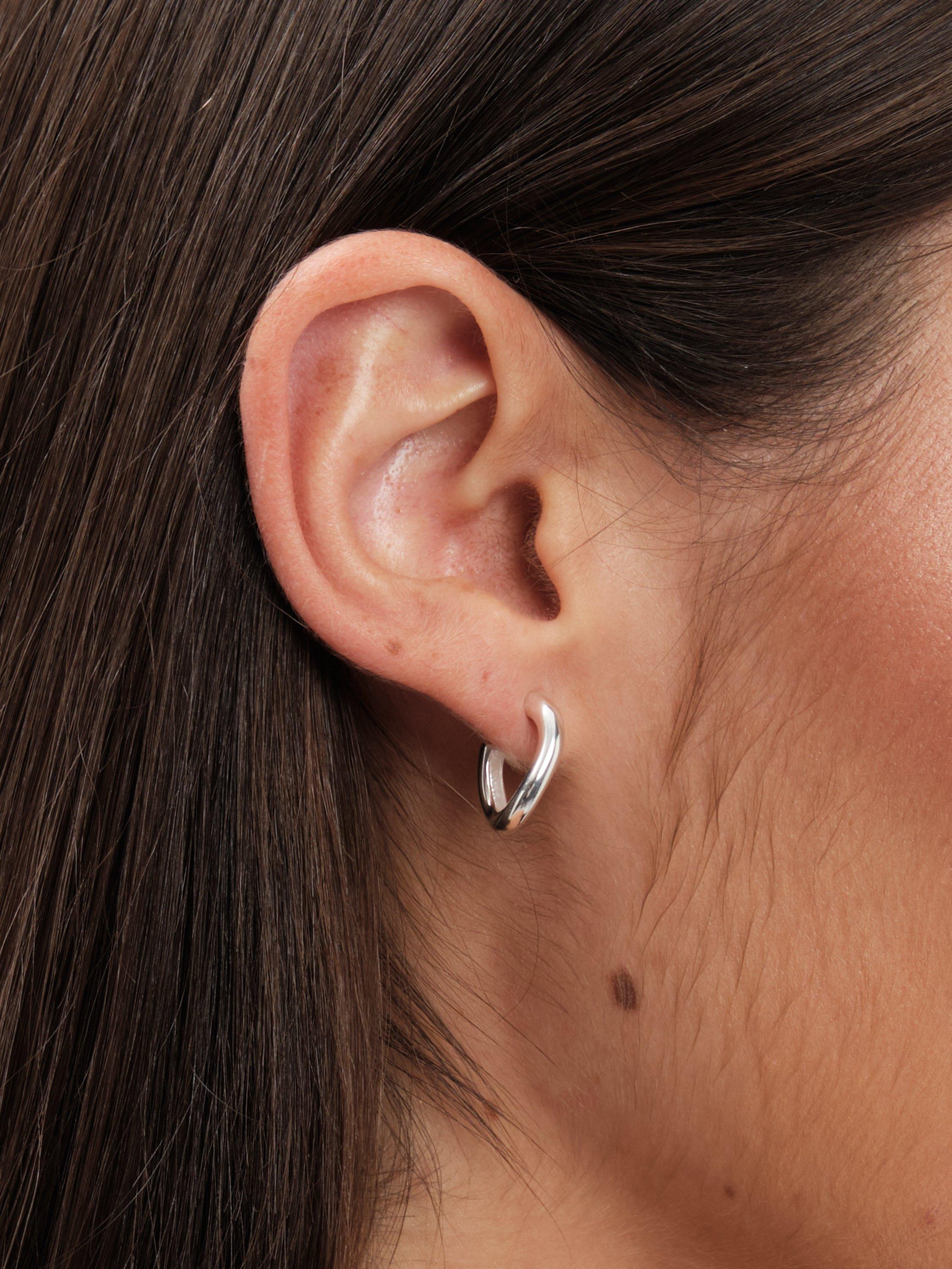 Product image 4 of 4, which shows Simply Silver Polished Curve Twist Hoop Earrings, Silver