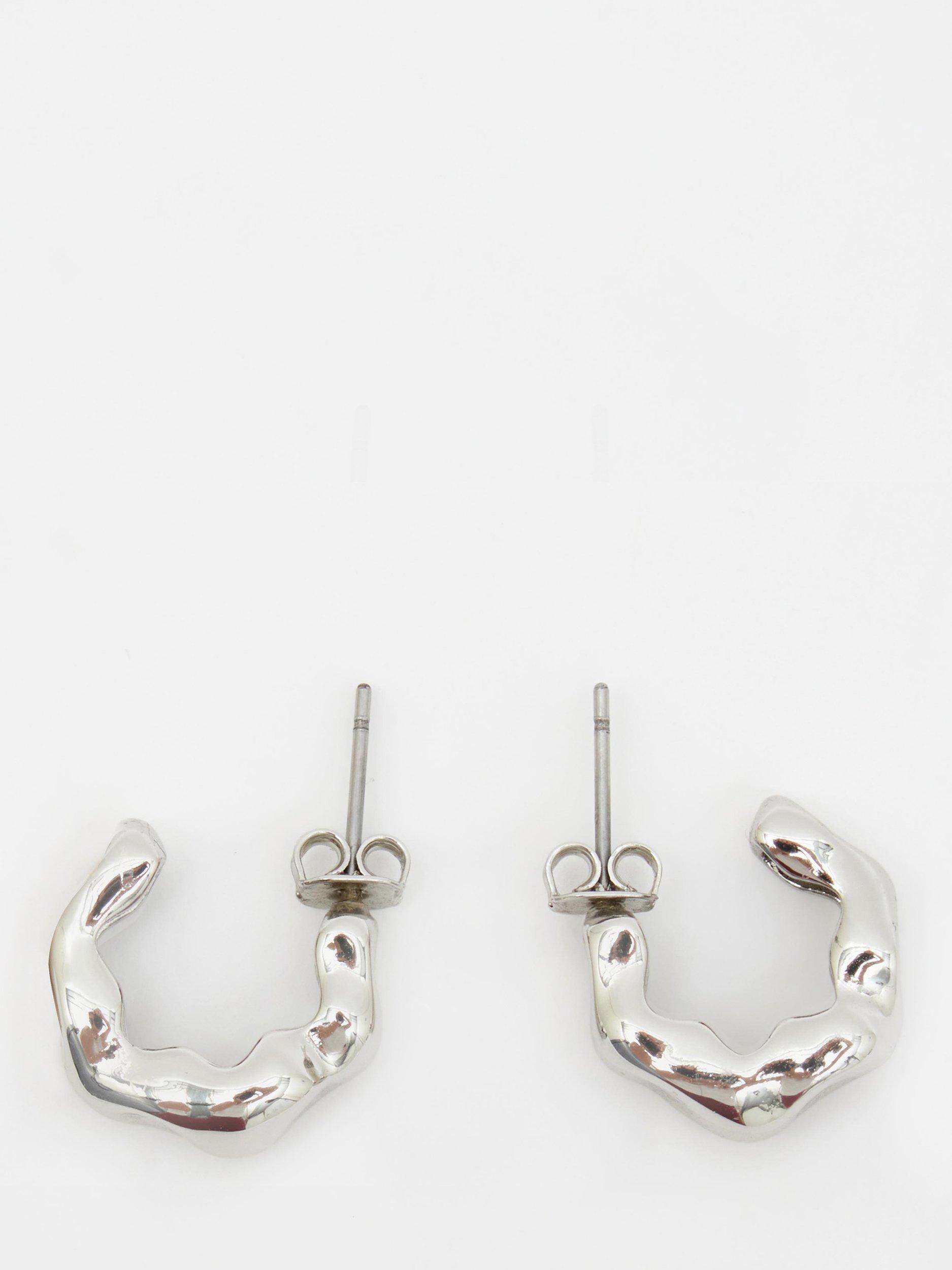 Product image 1 of 4, which shows HUSH Wave Huggie Demi Hoop Earrings, Silver