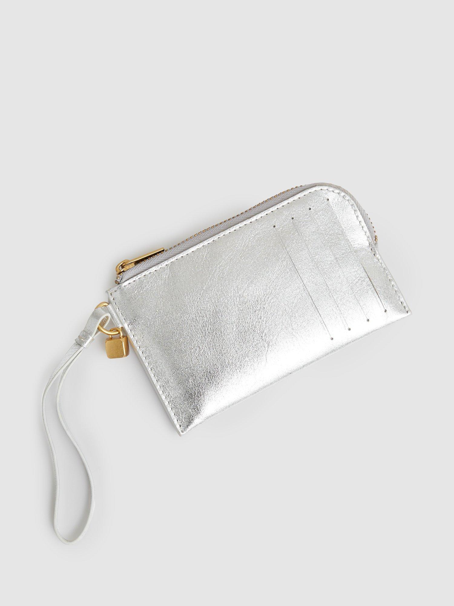 Product image 2 of 3, which shows Reiss Gloria Metallic Leather Zip-Around Wristlet Purse, Silver