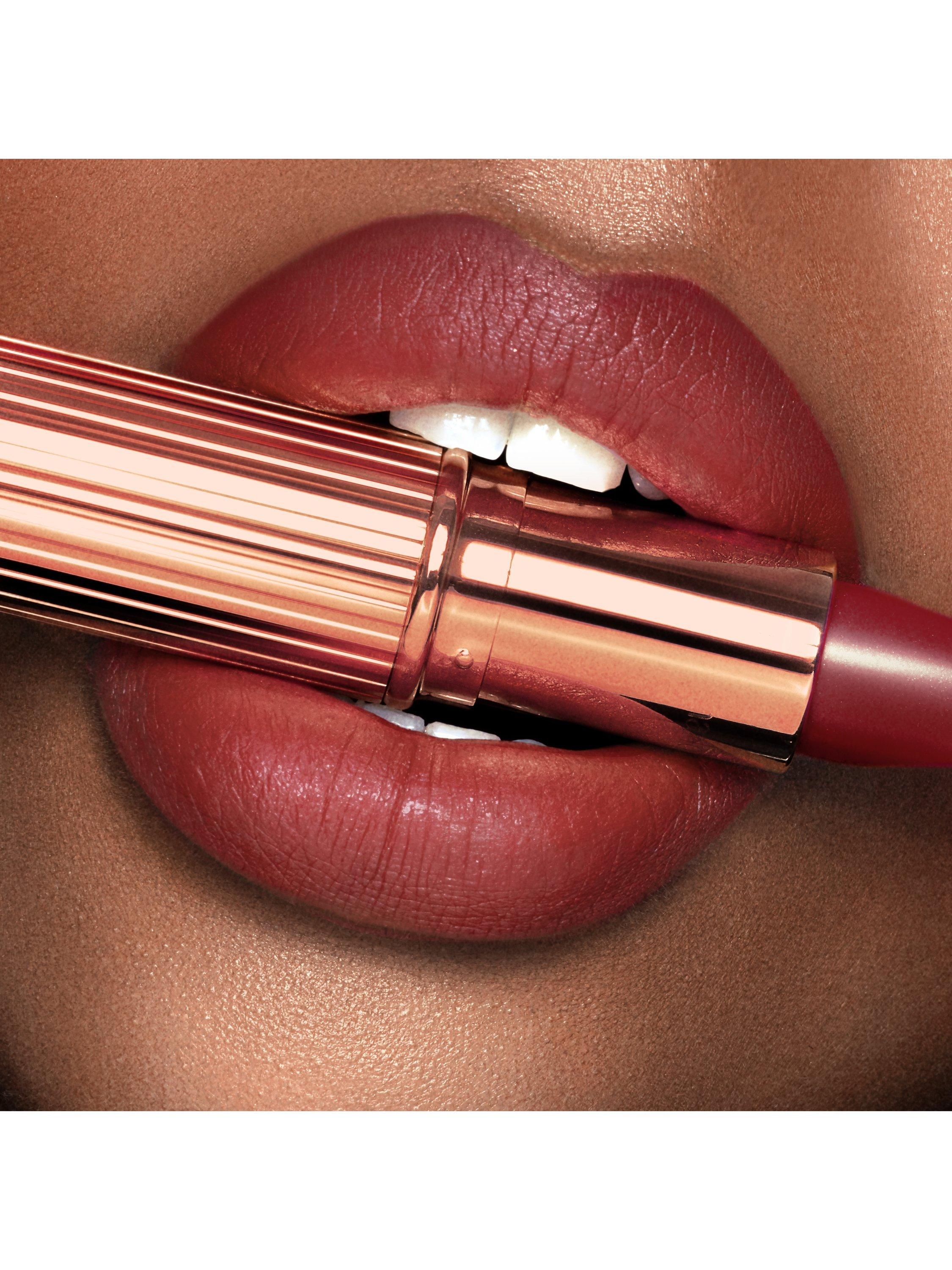 Product image 4 of 5, which shows Charlotte Tilbury Matte Revolution Lipstick, M.I. Kiss