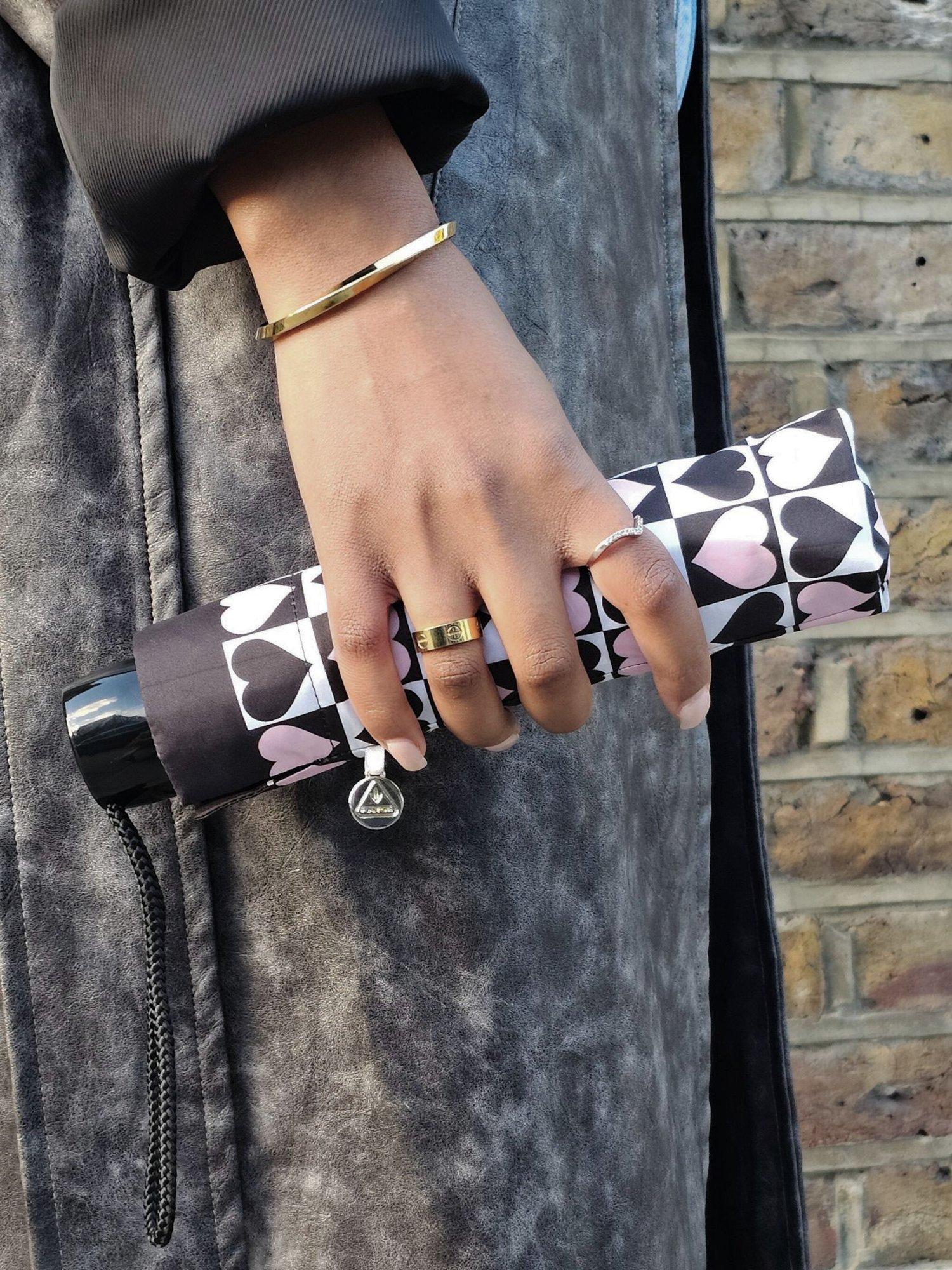 Product image 9 of 9, which shows Fulton L354 Minilite 2 Harlequin Heart Umbrella, Black/Pink/White
