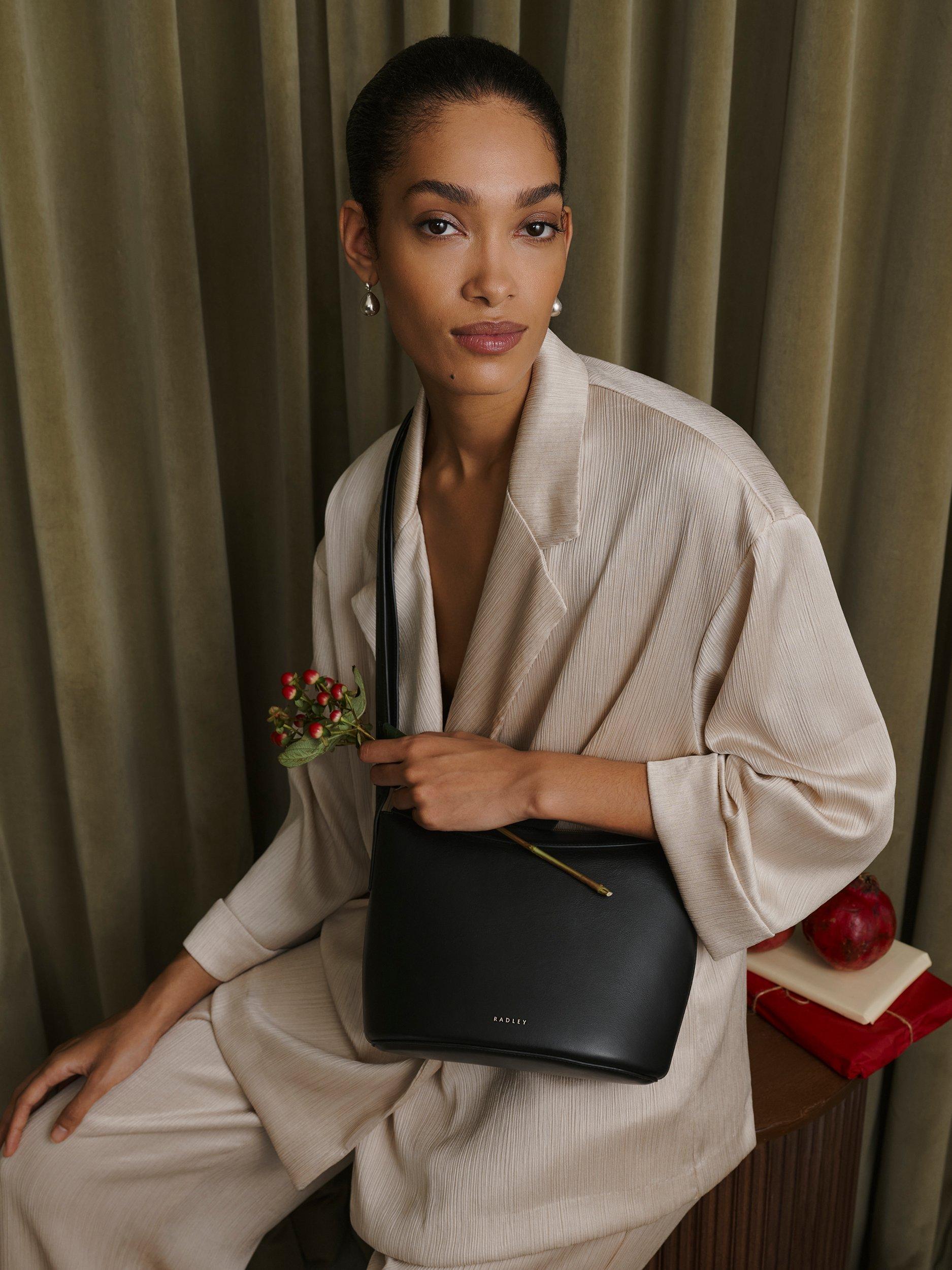 Product image 7 of 7, which shows Radley The Kensal Leather Small Zip Top Crossbody Bag, Black