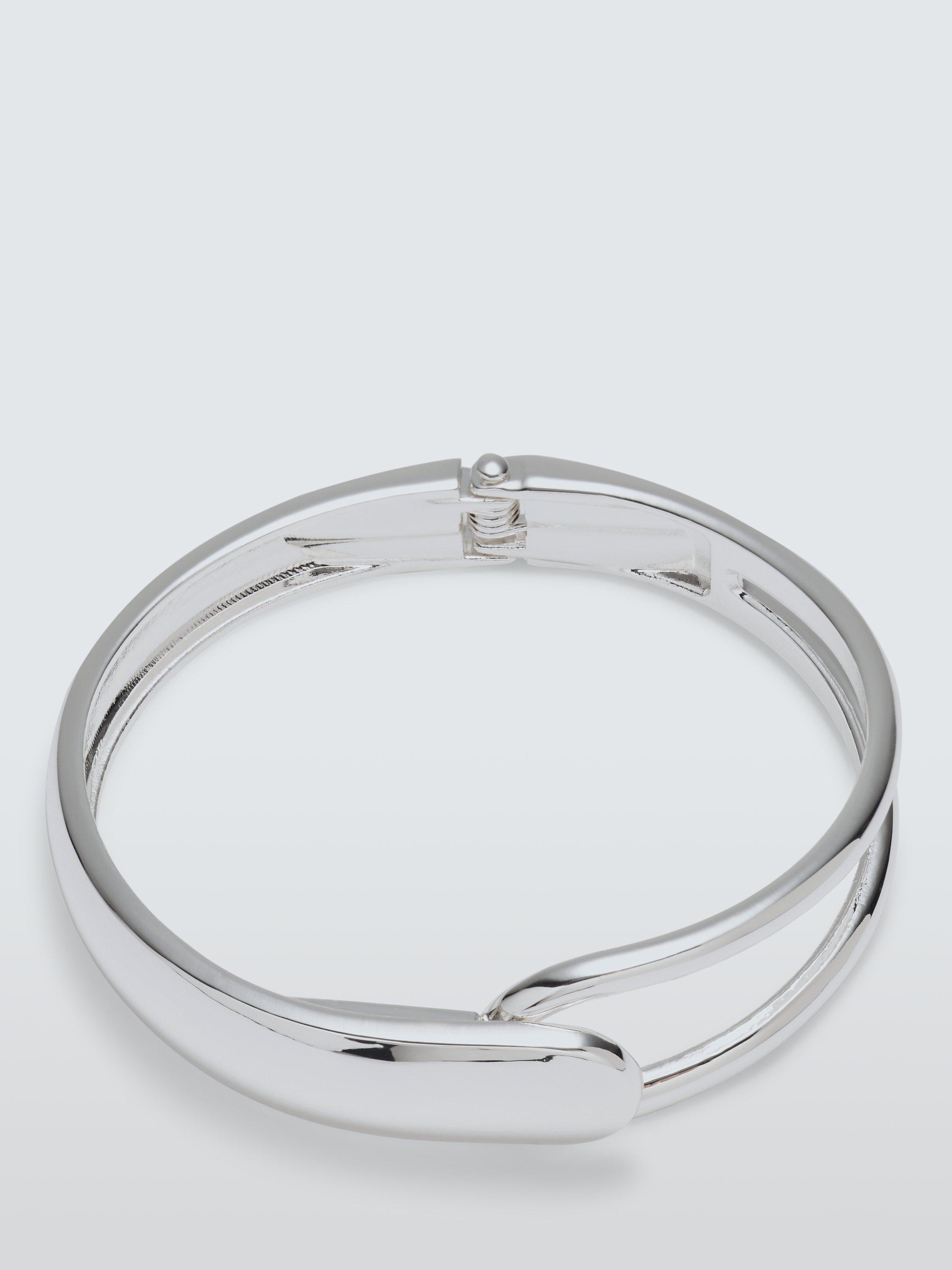 Product image 1 of 4, which shows John Lewis Hollow And Domed Overlapping Highly Polished Hinged Bracelet, Silver