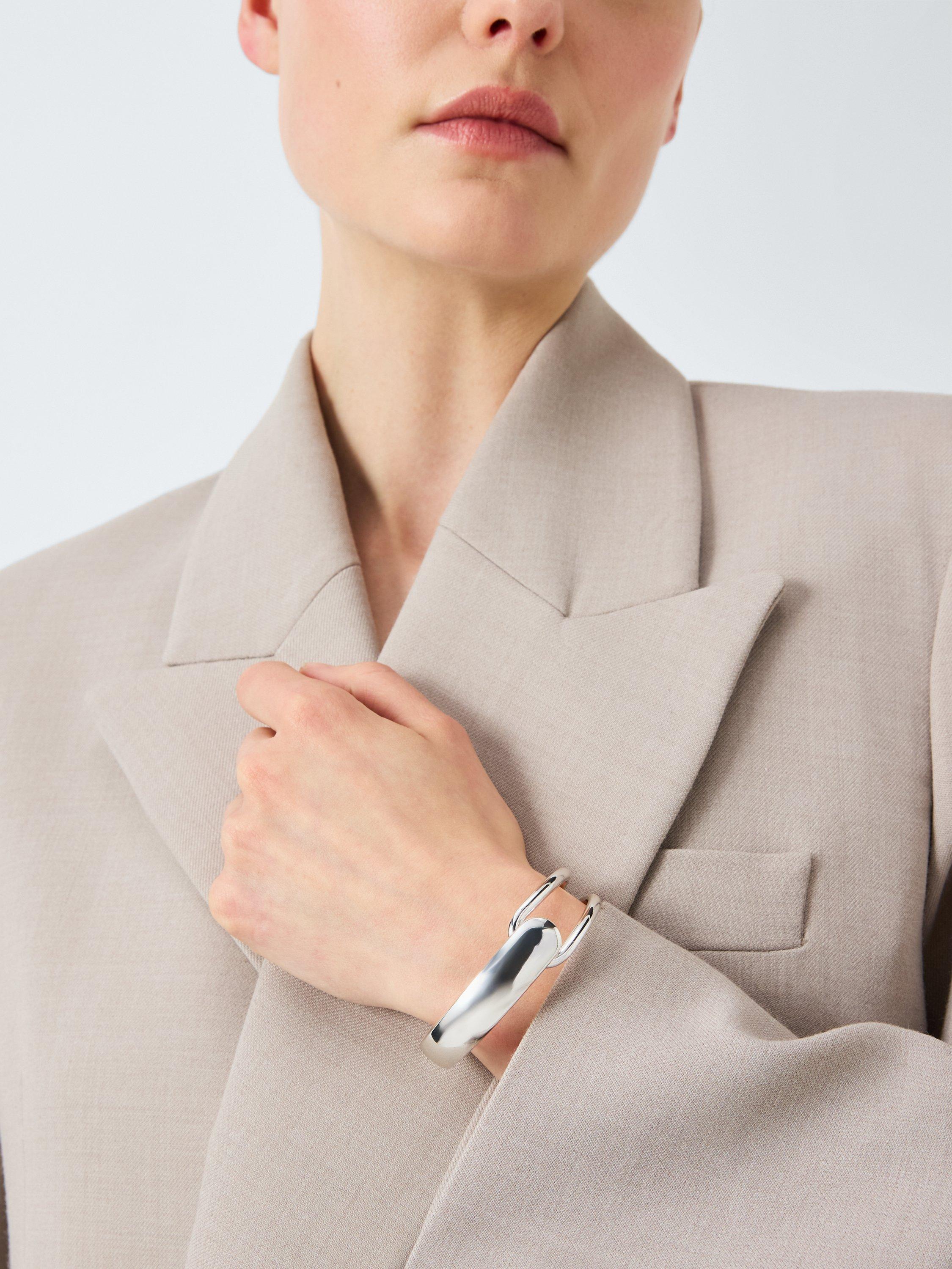 Product image 2 of 4, which shows John Lewis Hollow And Domed Overlapping Highly Polished Hinged Bracelet, Silver