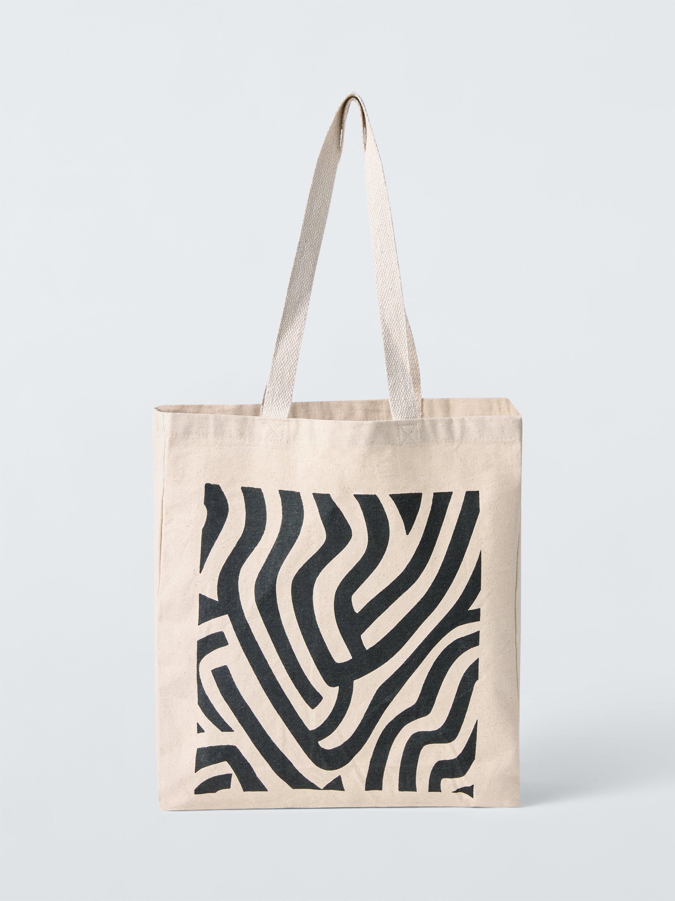 Product image 2 of 3, which shows John Lewis x John Cooper Strang Tote Bag, Natural/Black