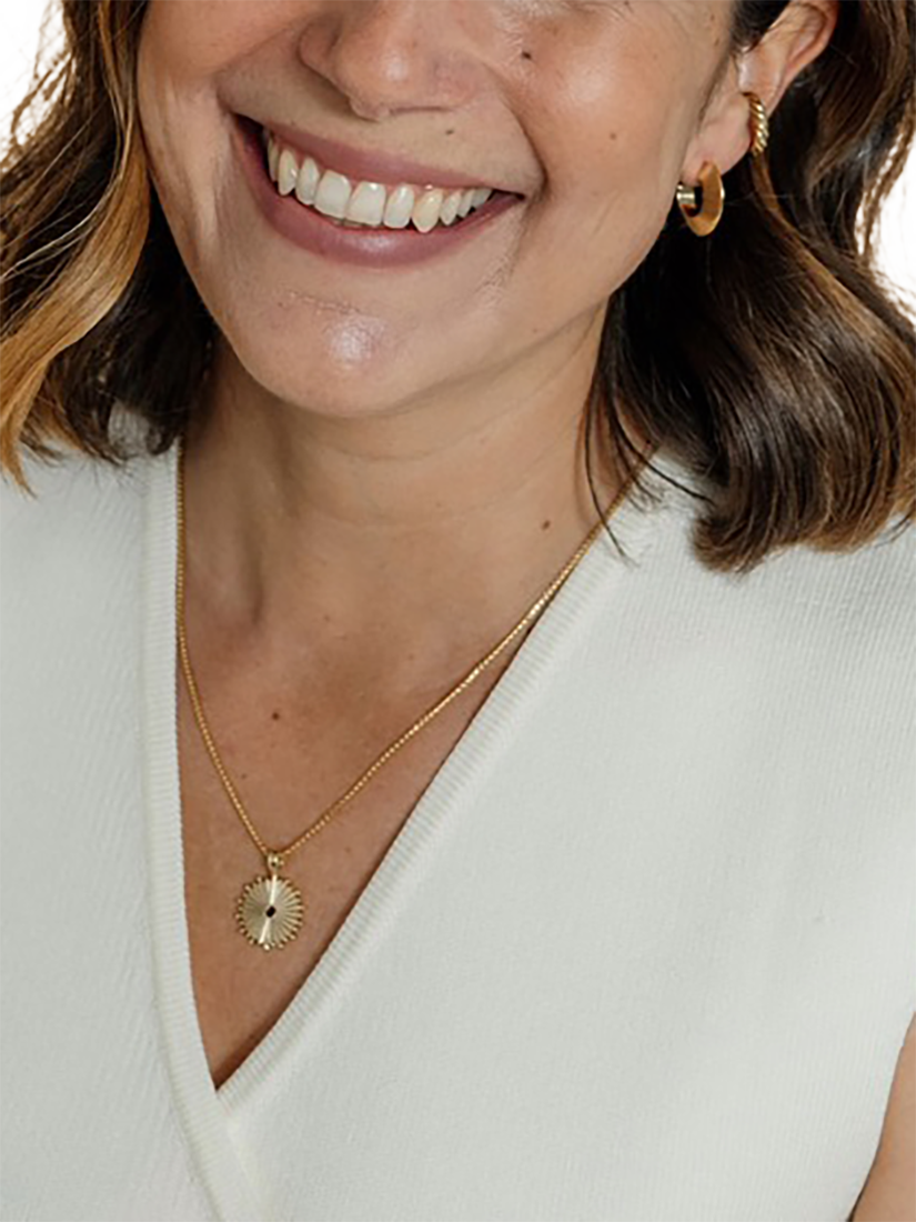 Product image 5 of 6, which shows LARNAUTI x RED January Garnet Sun Pendant Necklace, Gold