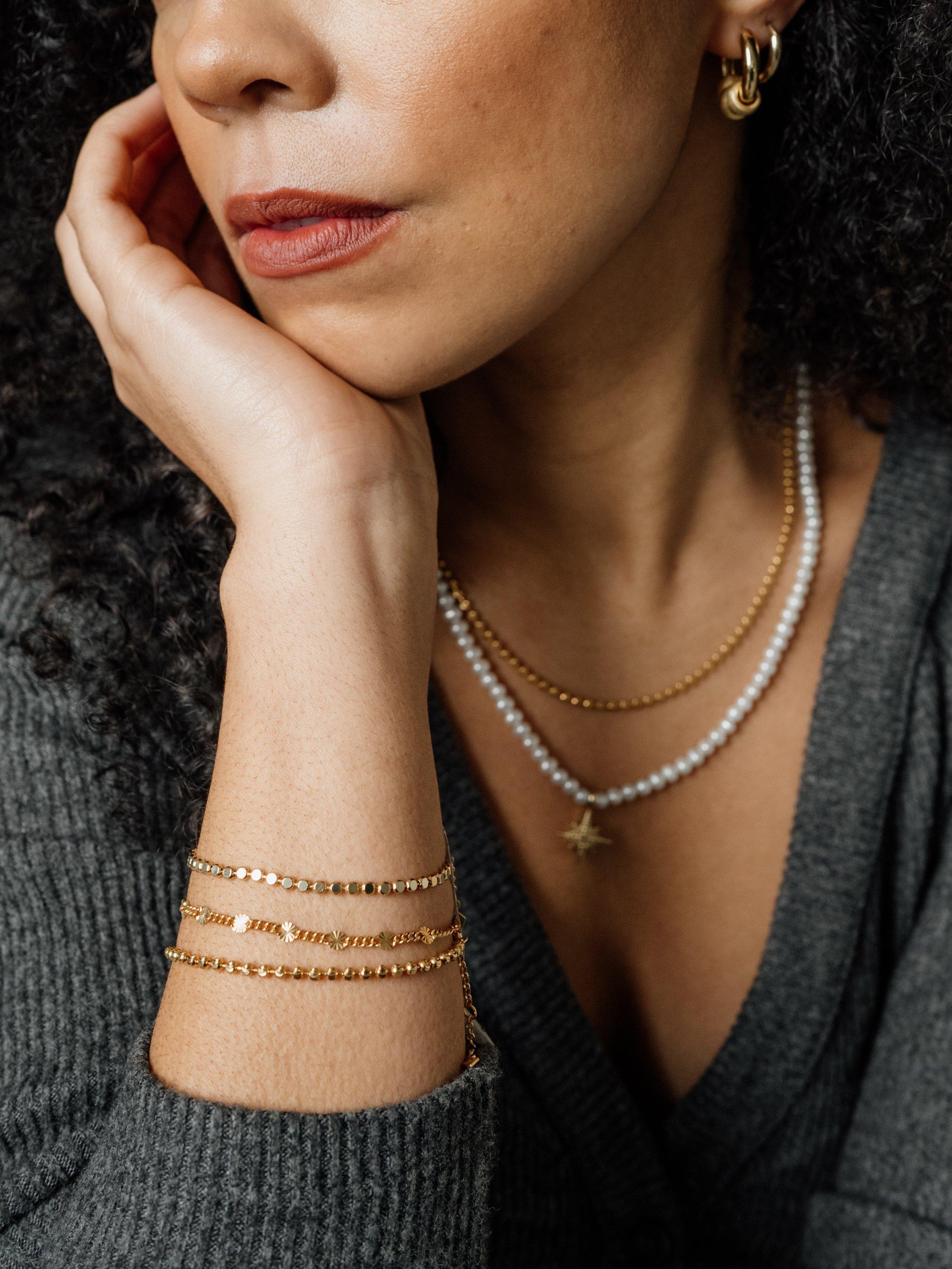Product image 3 of 5, which shows LARNAUTI Polished and Sand Blasted Hoop Earrings, Gold