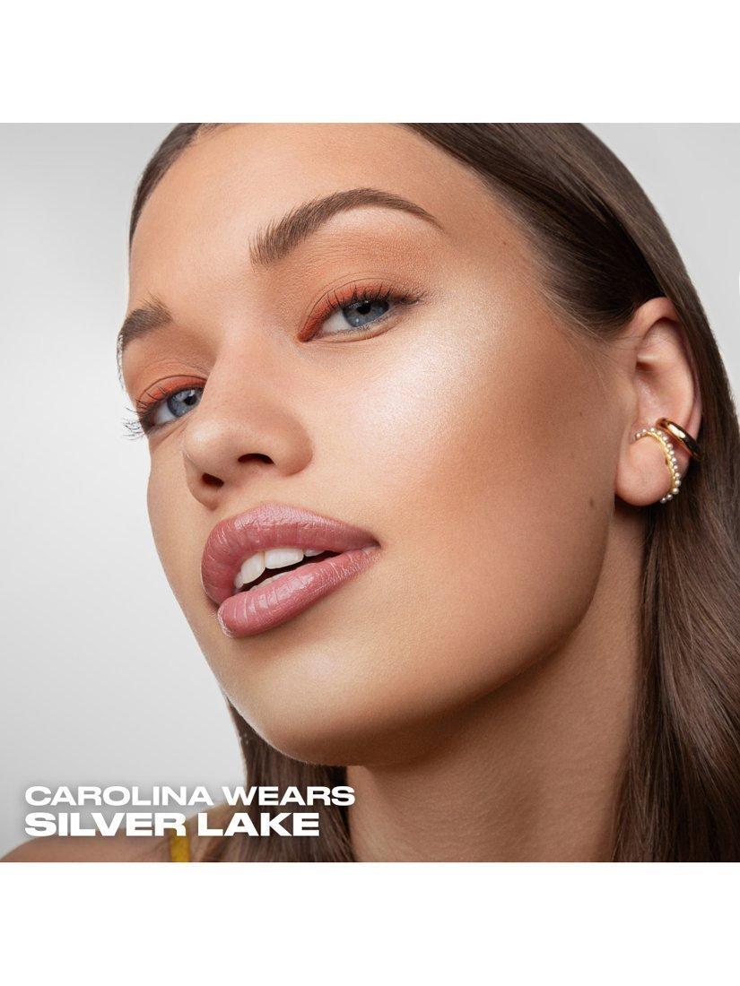 Product image 4 of 9, which shows Urban Decay Face Bond Luminizer, Silverlake