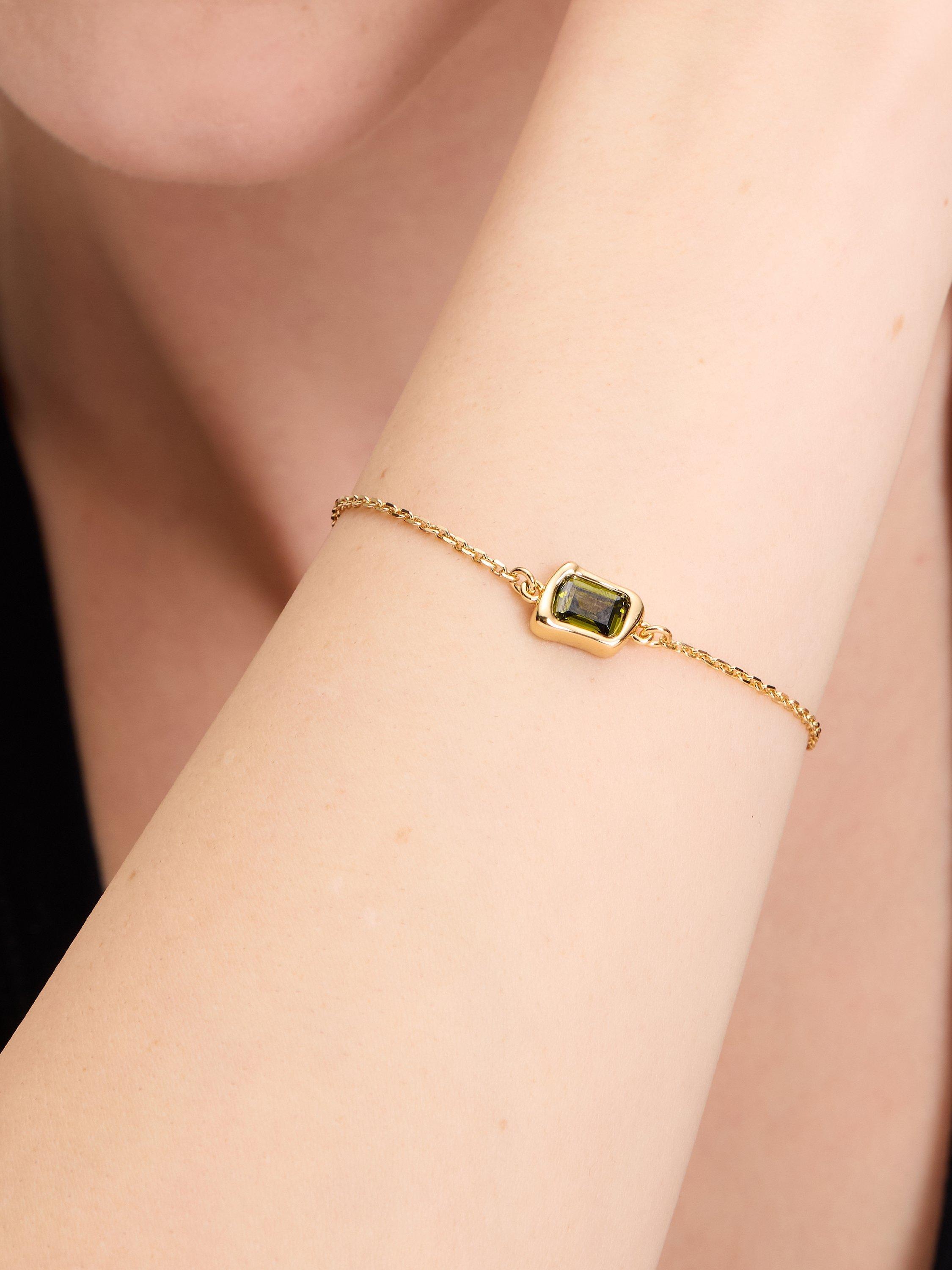 Product image 3 of 3, which shows kate spade new york Cubic Zirconia Sculptural Solitaire Bracelet, Green/Gold
