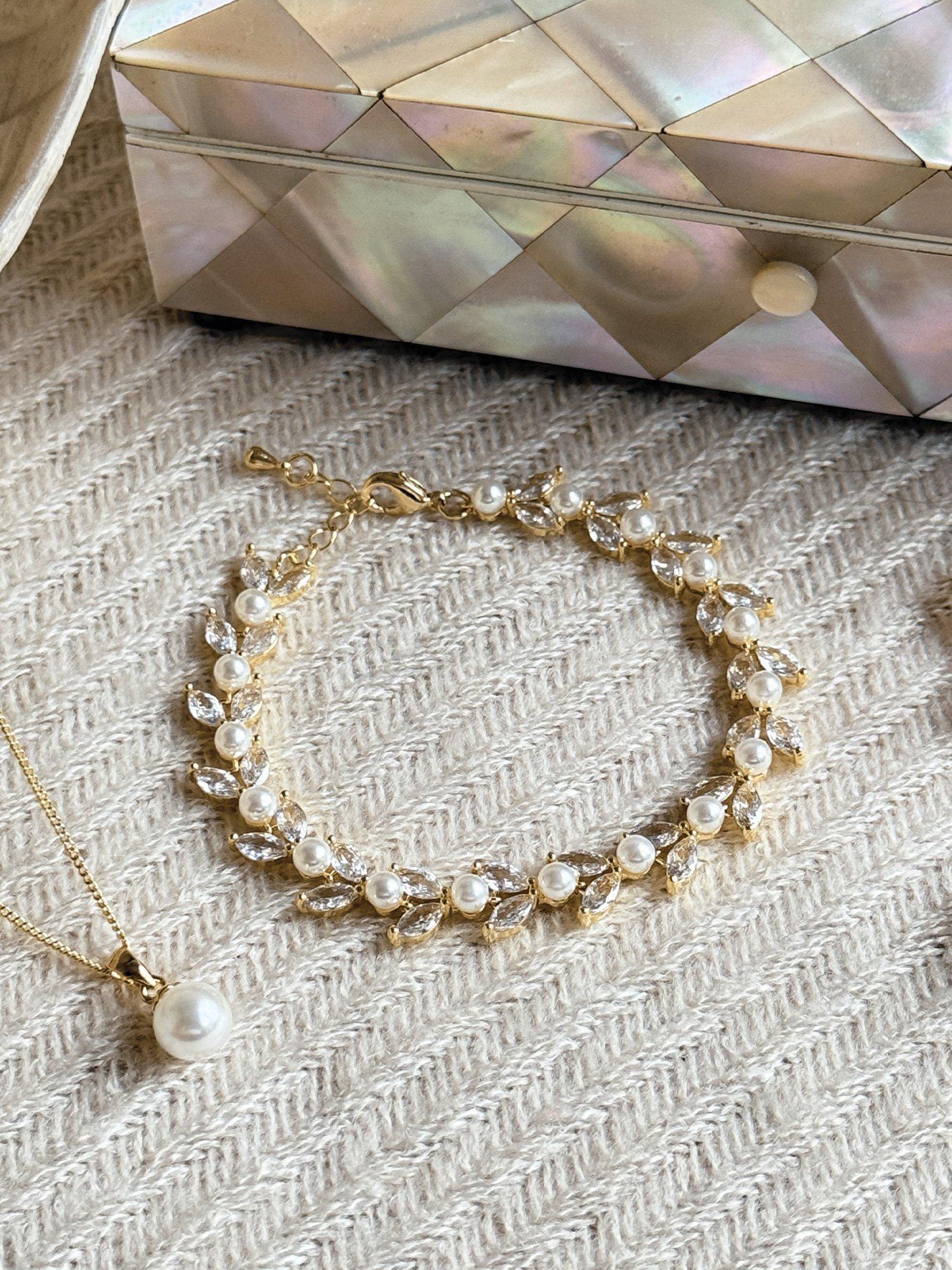 Product image 3 of 4, which shows Ivory & Co. Boston Cubic Zirconia Leaf & Pearl Bracelet, Yellow Gold