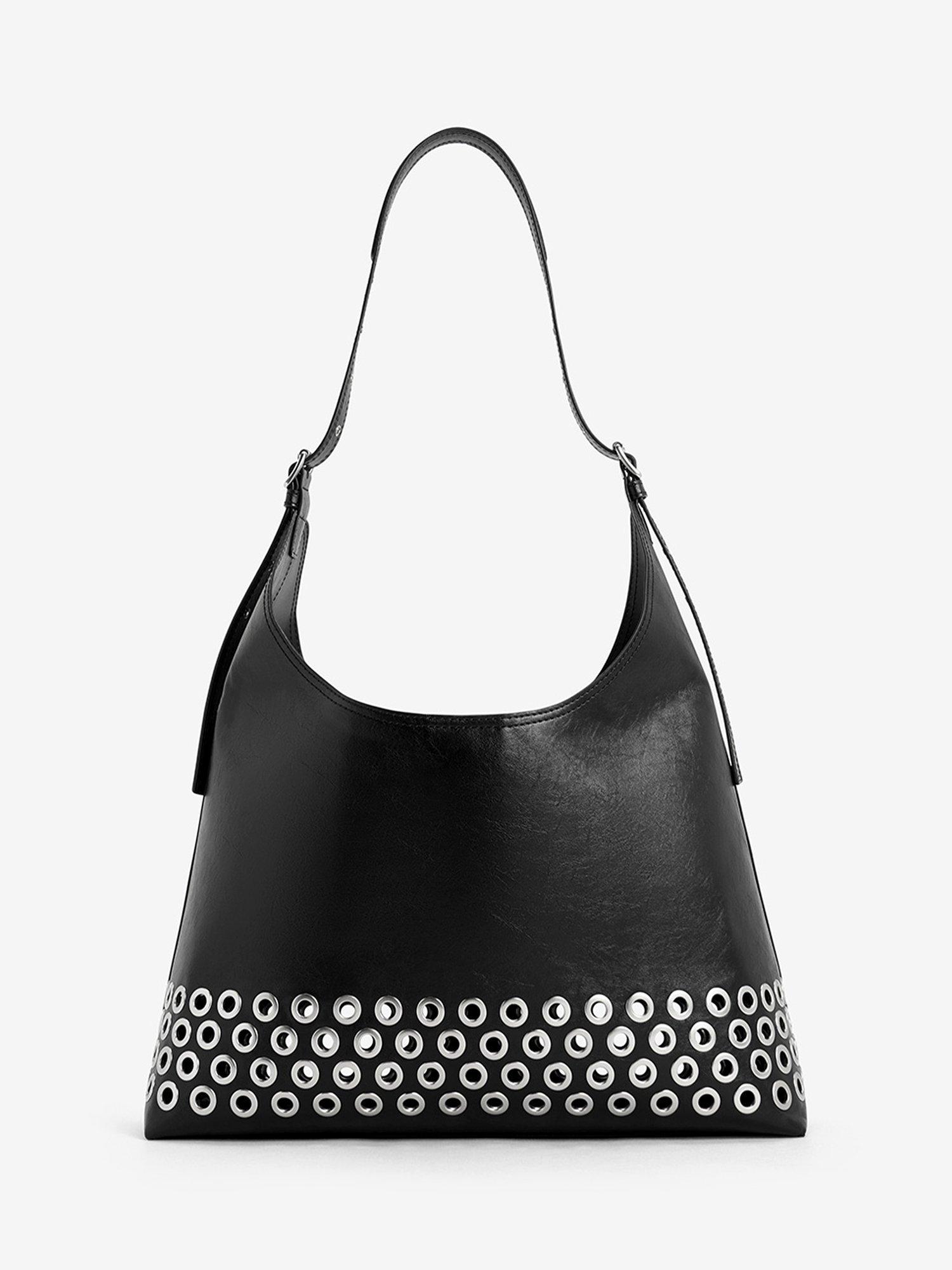 Product image 3 of 5, which shows CHARLES & KEITH Liv Grommet Embellished Hobo Bag, Black