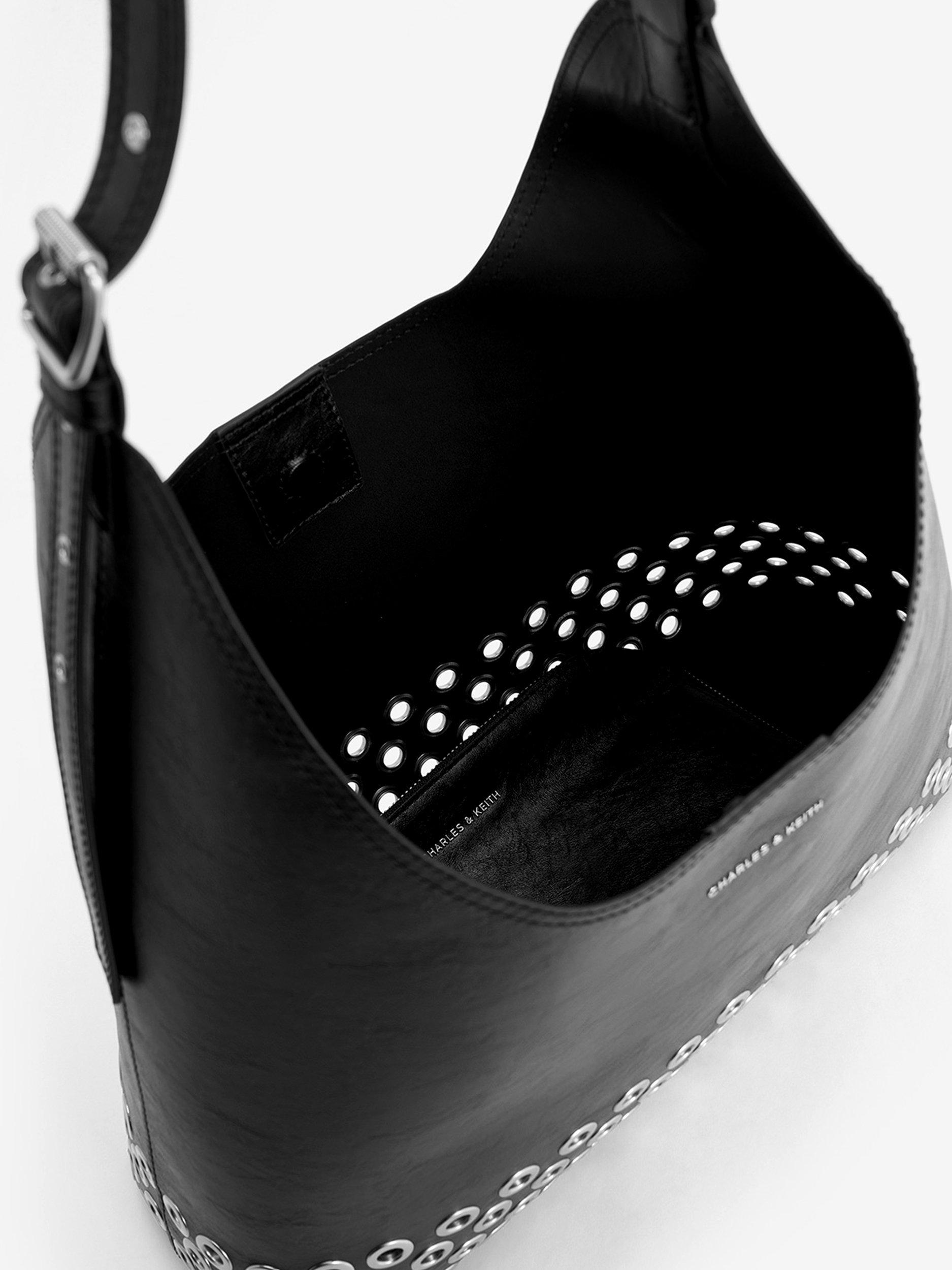 Product image 4 of 5, which shows CHARLES & KEITH Liv Grommet Embellished Hobo Bag, Black