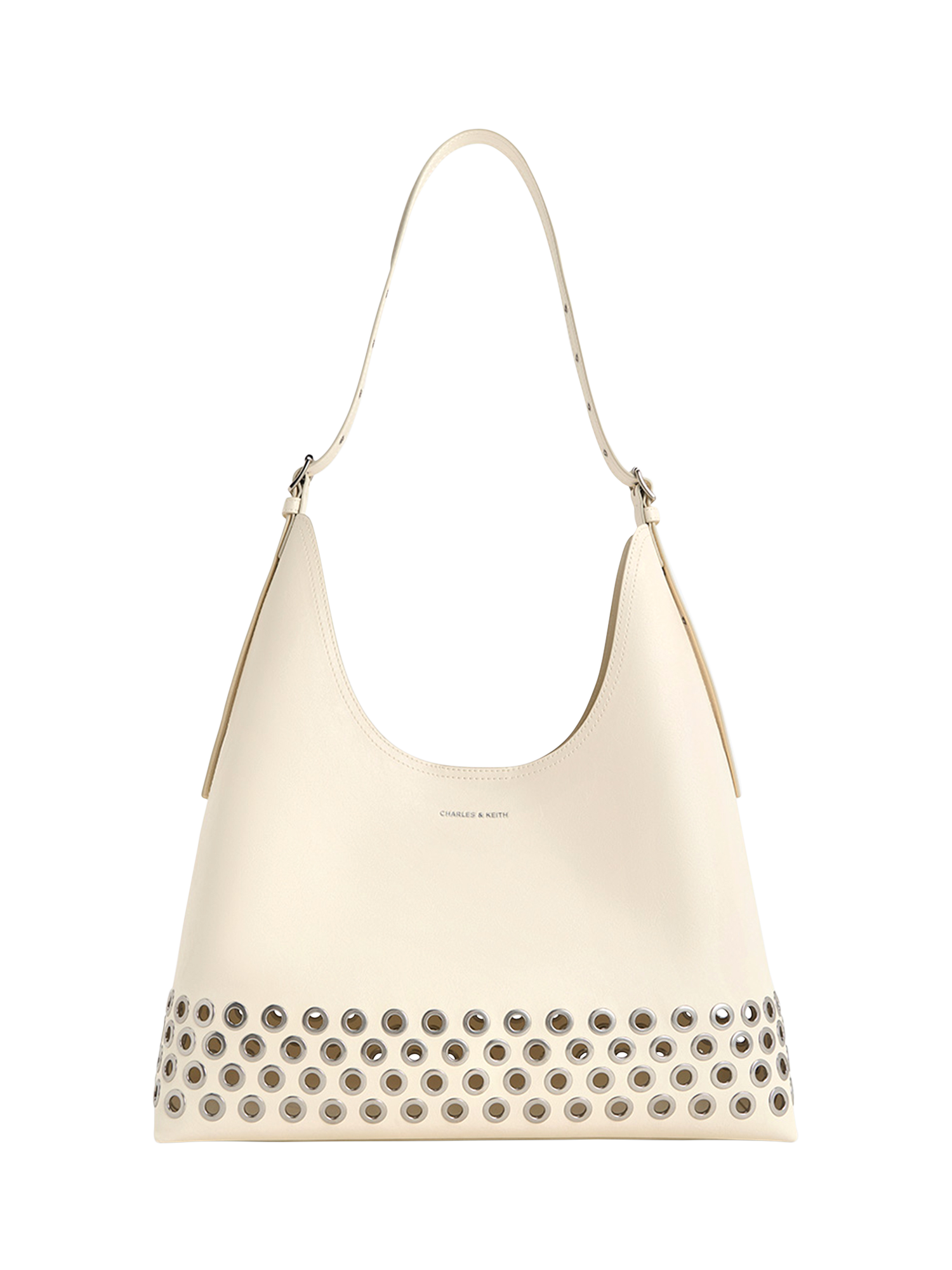 Product image 1 of 4, which shows CHARLES & KEITH Liv Grommet Embellished Hobo Bag, Cream